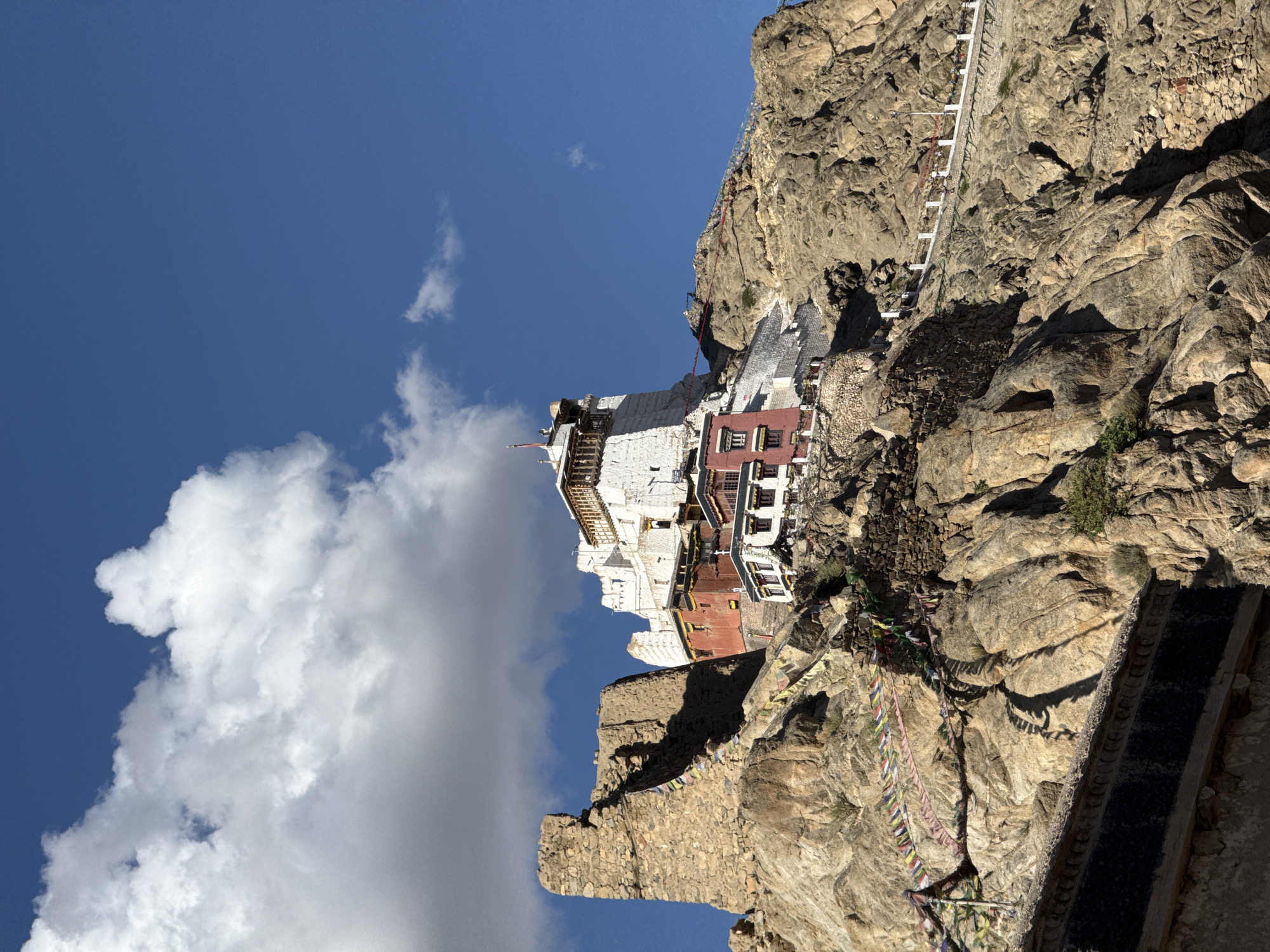 Leh's hilltop monasteries and stupas under a clear summer sky