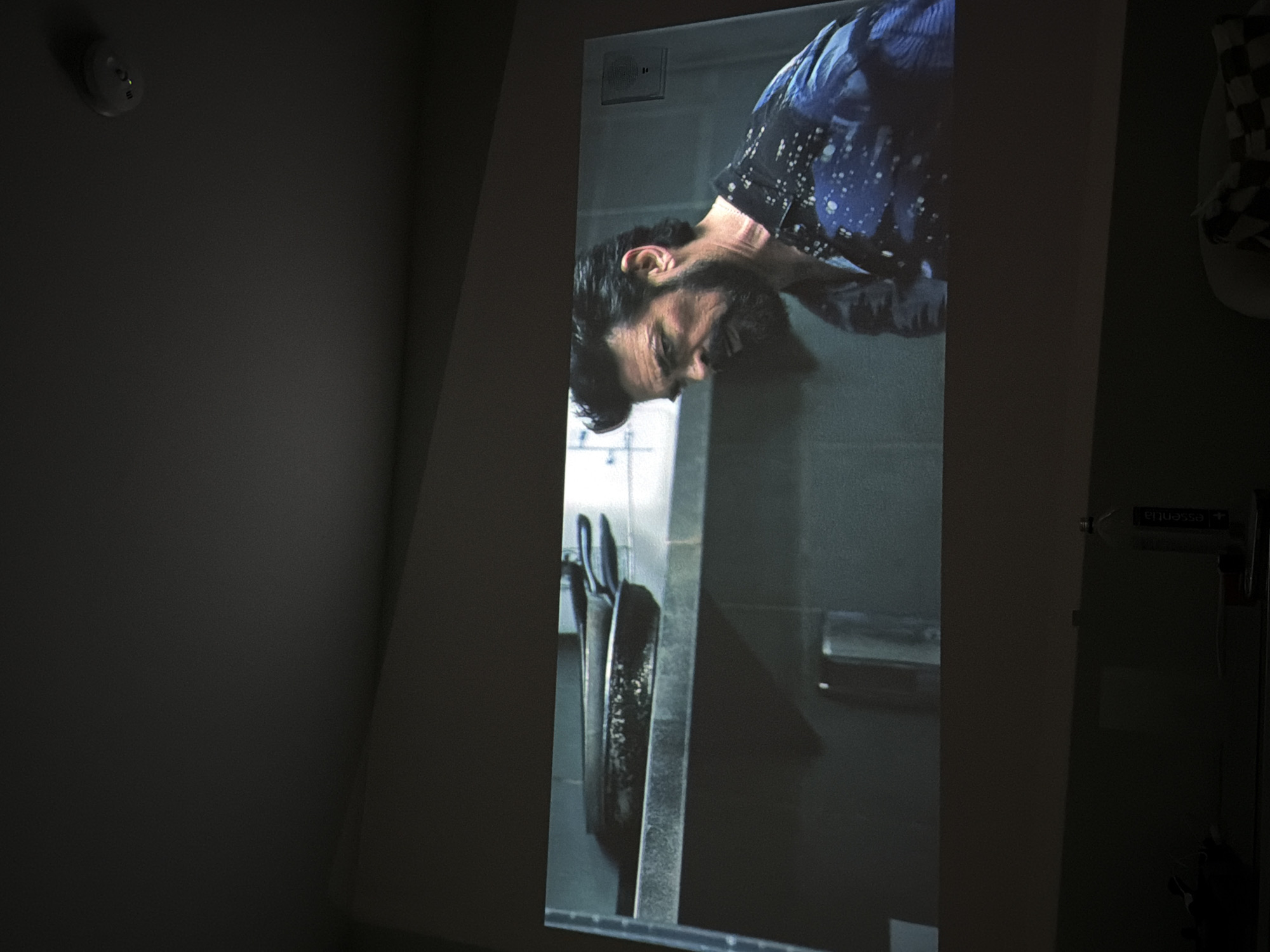 TV show projected on wall in Los Angeles room
