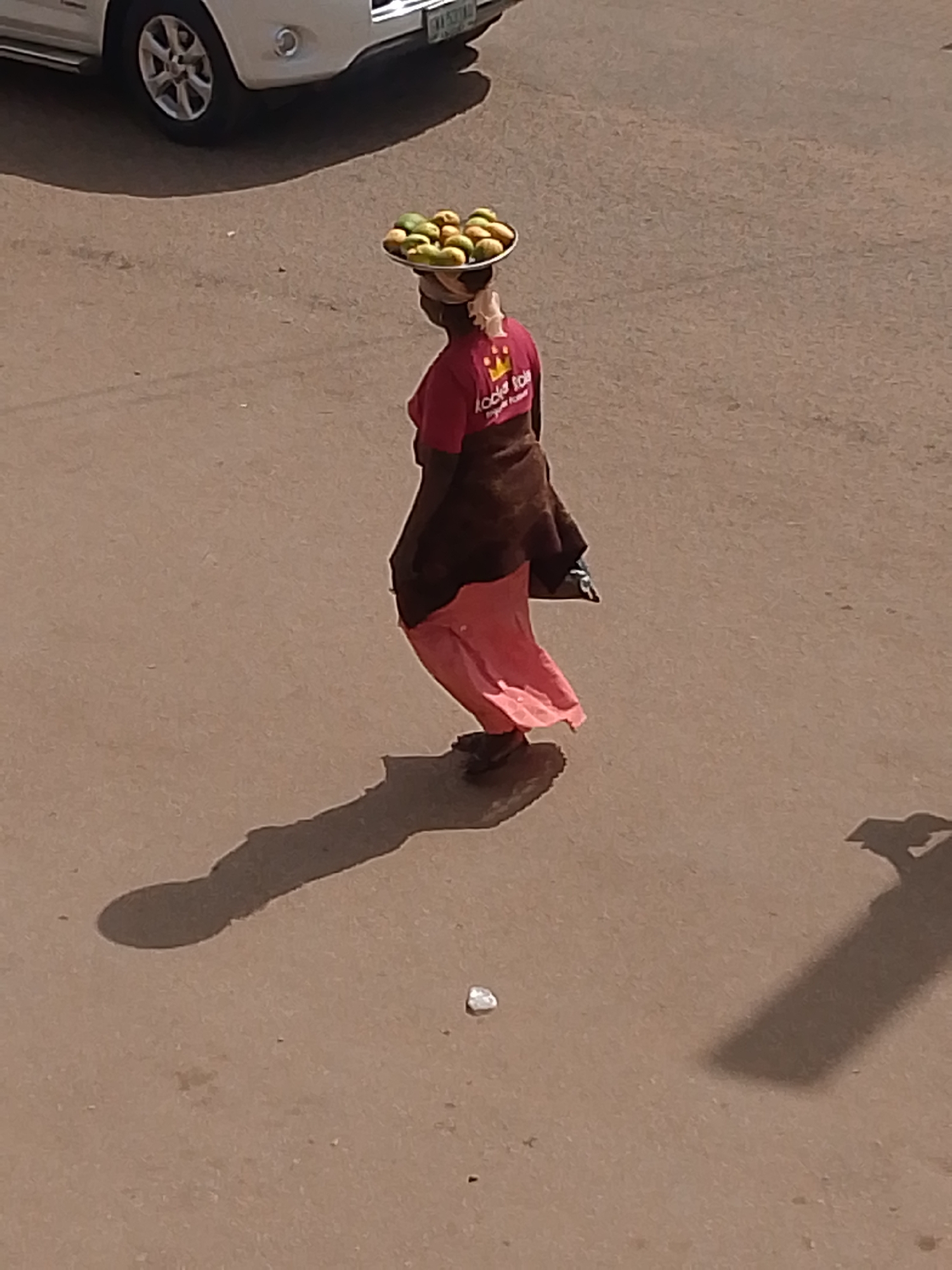 Ordinary afternoon street life documented across Bukuru, Nigeria