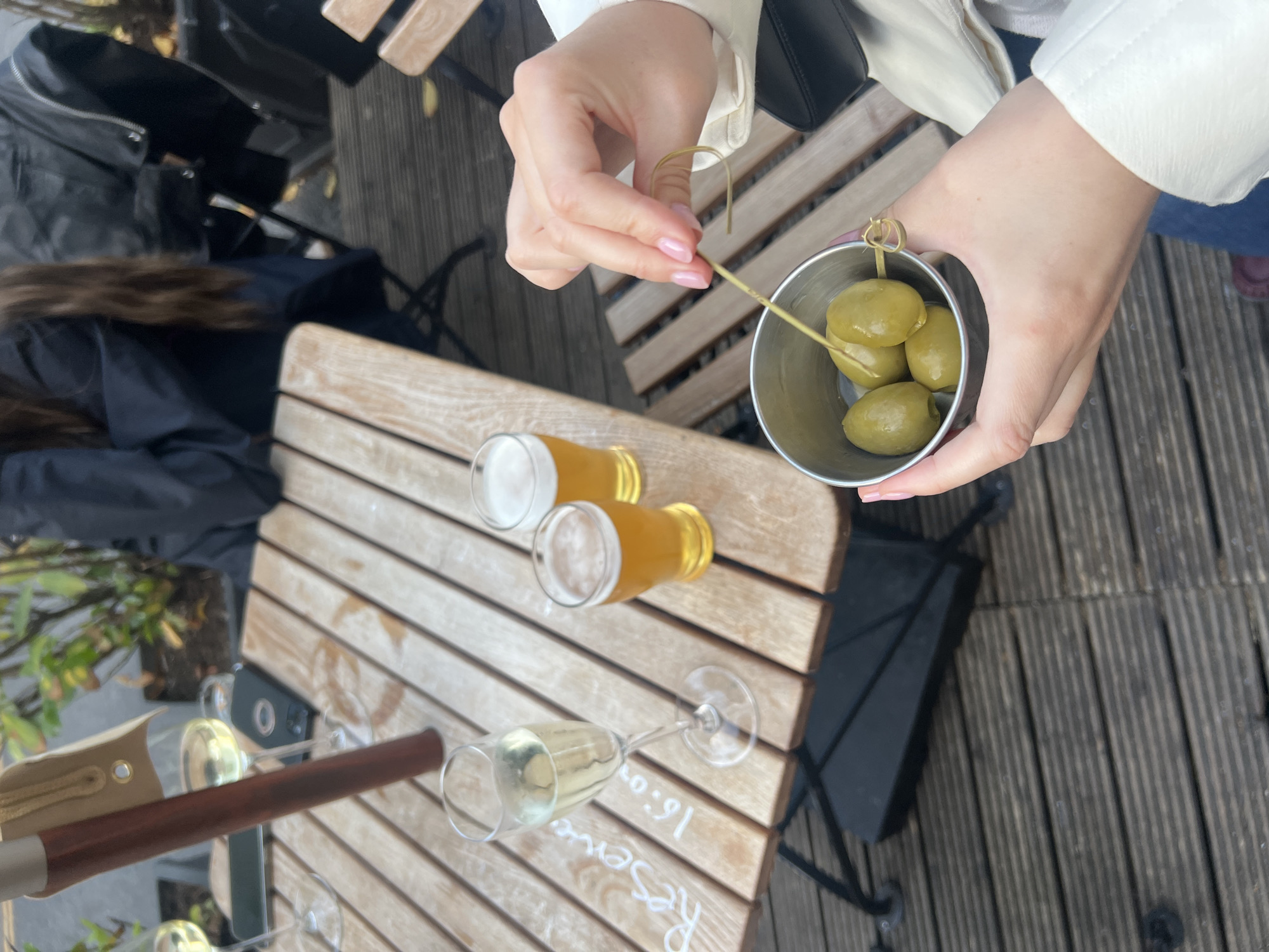 Evening drinks and dining captured at London outdoor restaurant