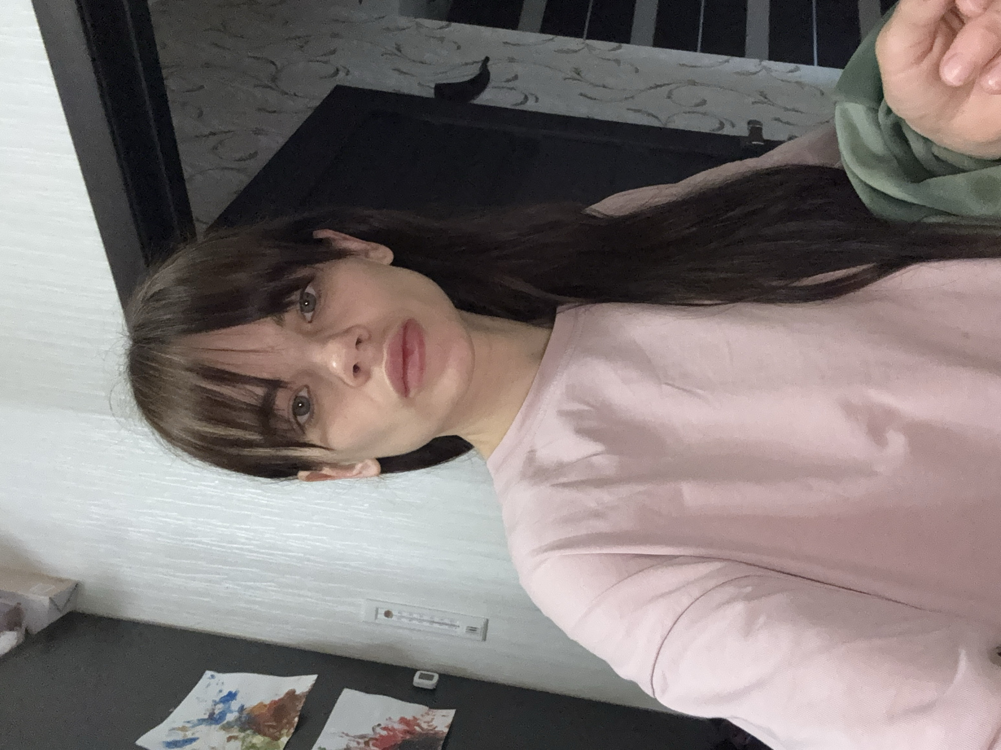 Woman takes mirror selfies in Rostov-on-Don early morning