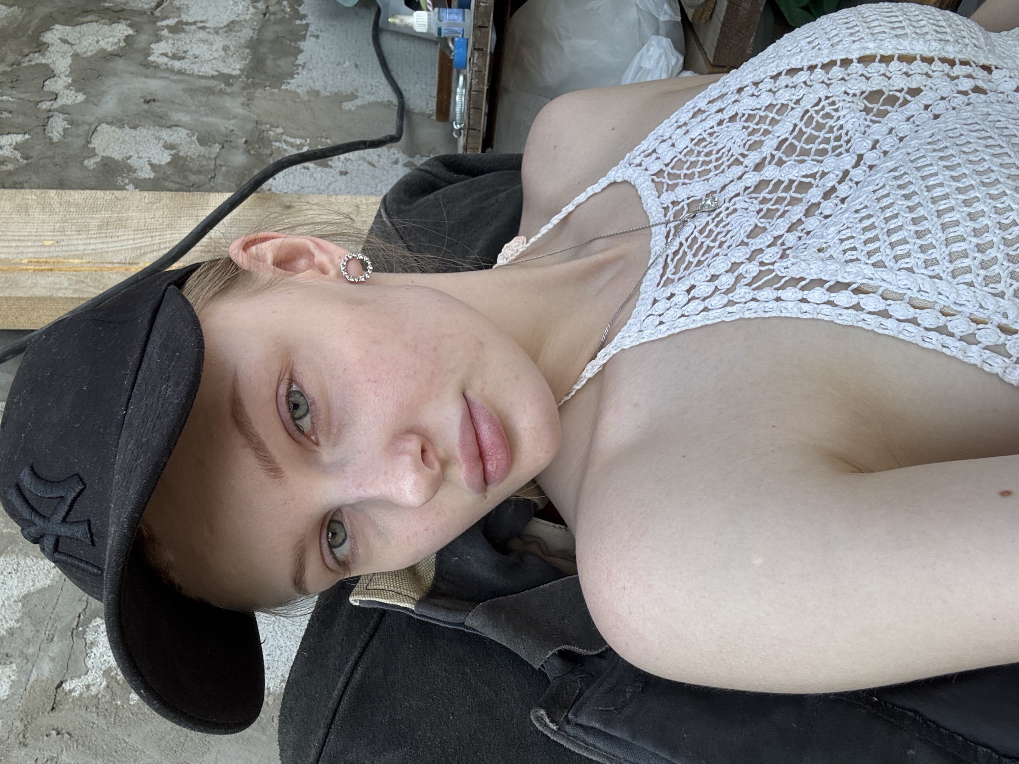 Woman in NY cap photographed in Perm, Russia