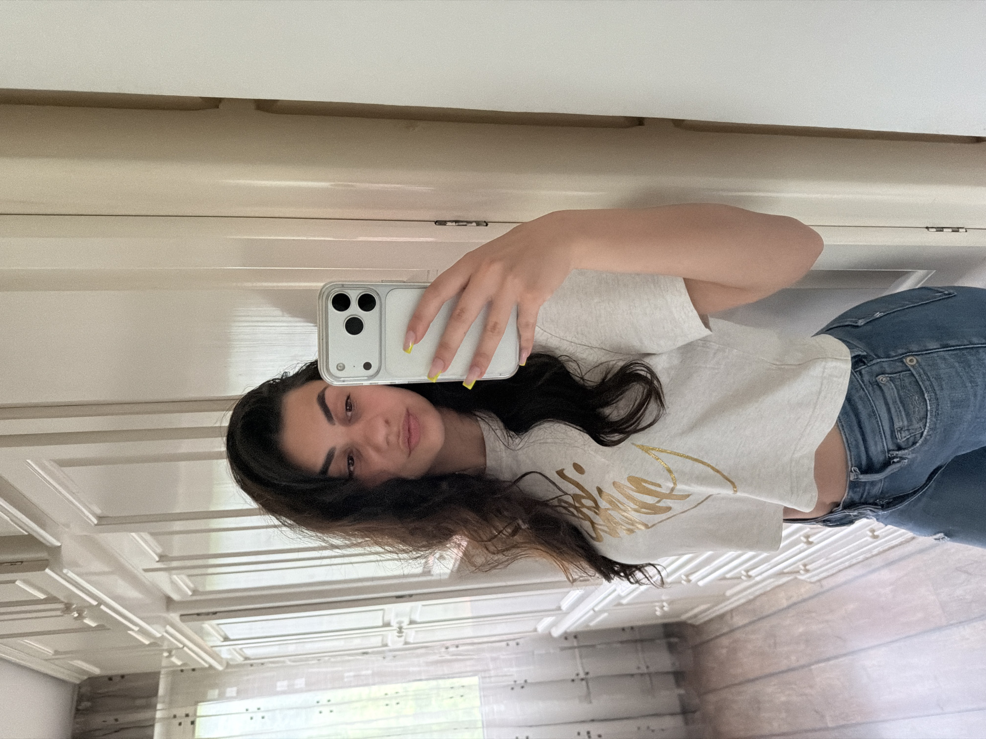 Woman takes mirror selfies in Gabrovo, Bulgaria