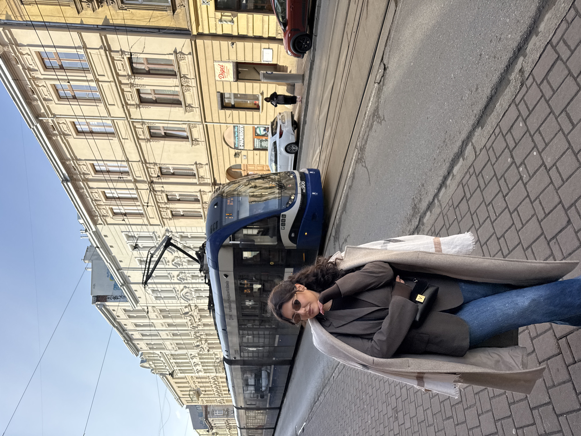 Morning tram commute captured on historic Krakow streets