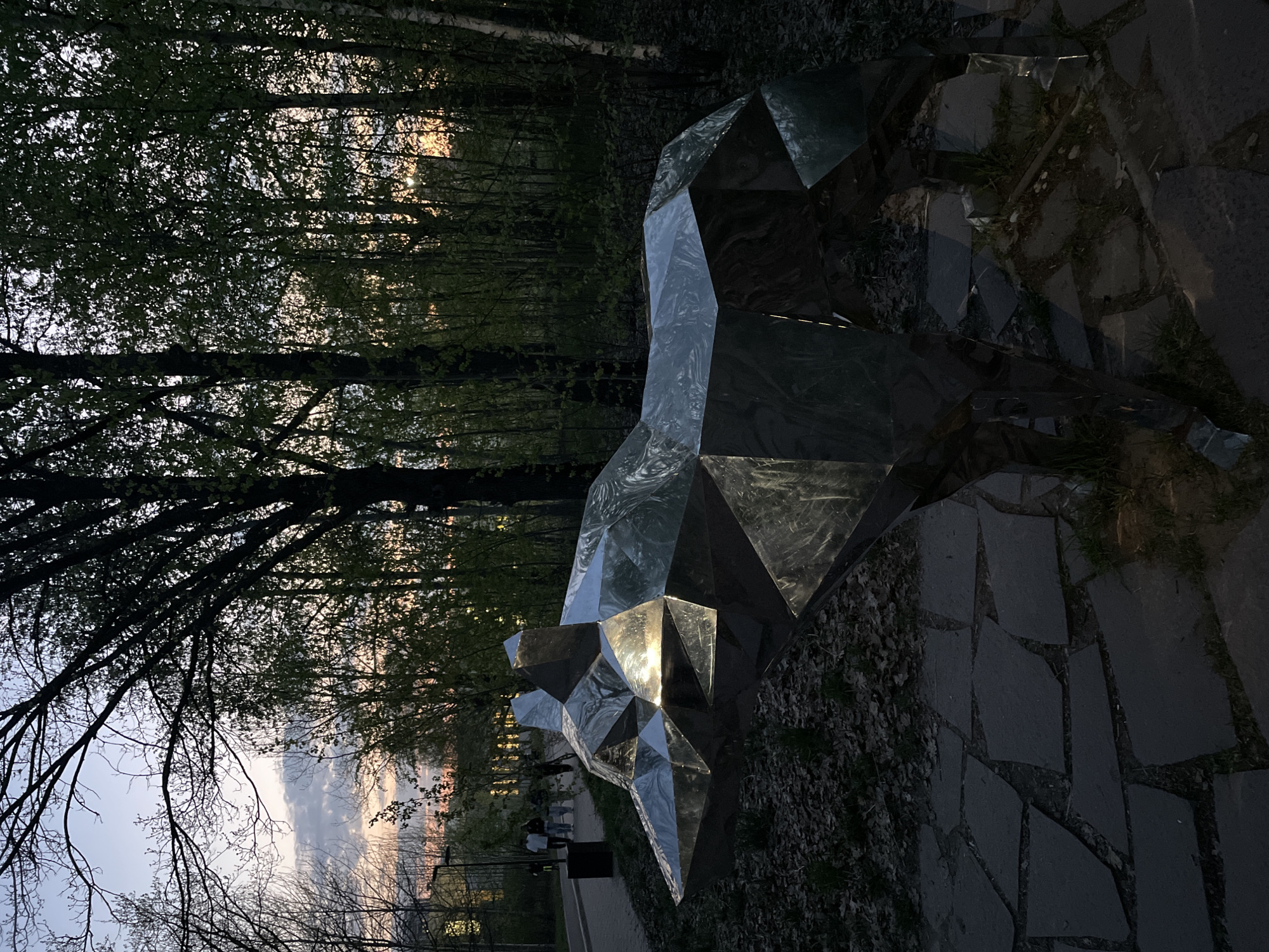 Evening documentation captures metal sculpture and dusk scenes in Kazan