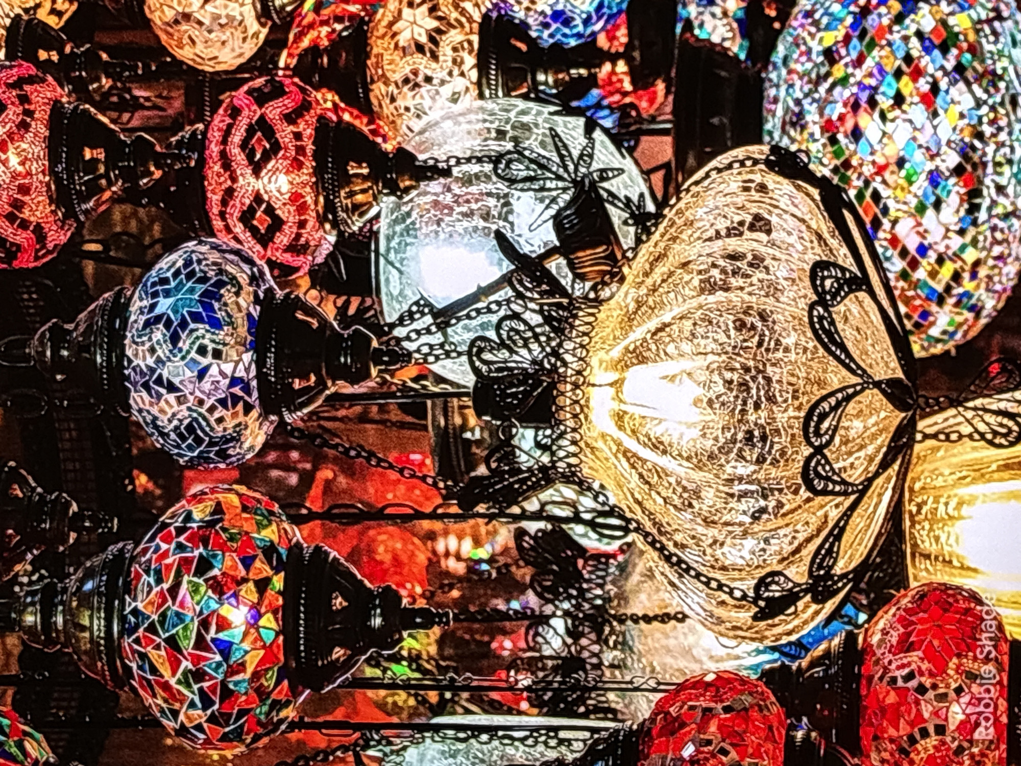 Mosaic lamps, a white cat, and chrysanthemums in Krasnokamsk