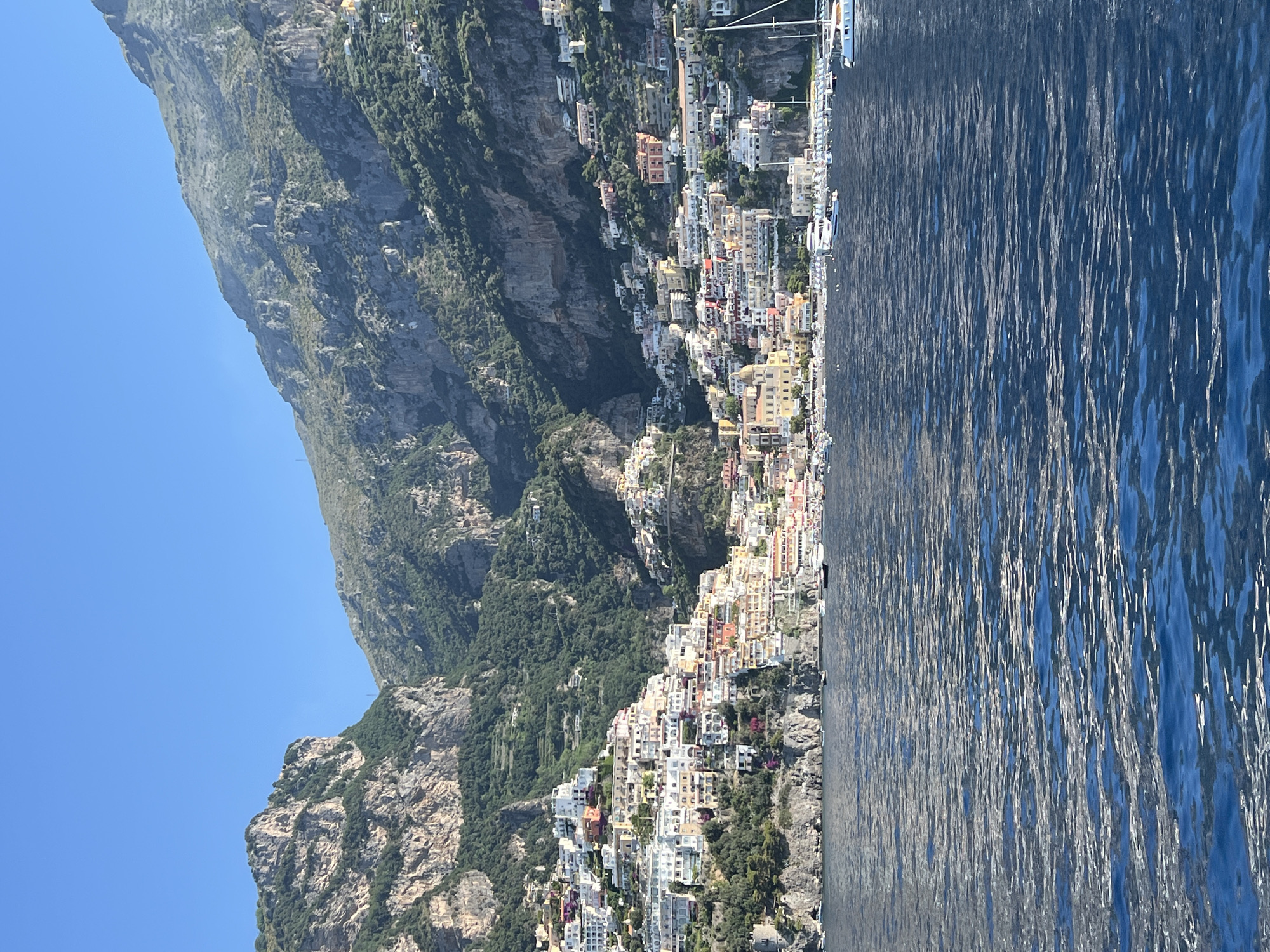 Morning boat views capture Amalfi Coast town Arienzo from sea