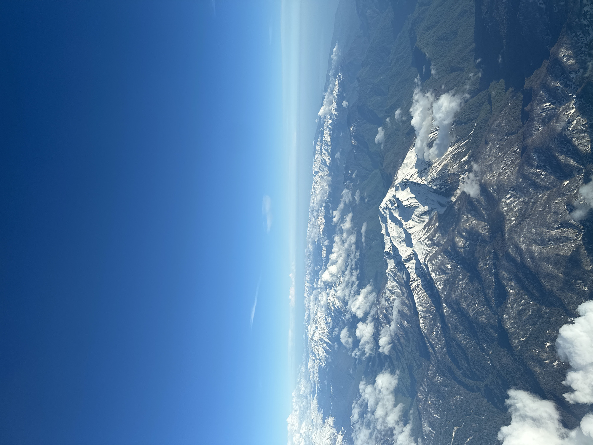 Aircraft captures aerial views of snowy mountains near Khimki
