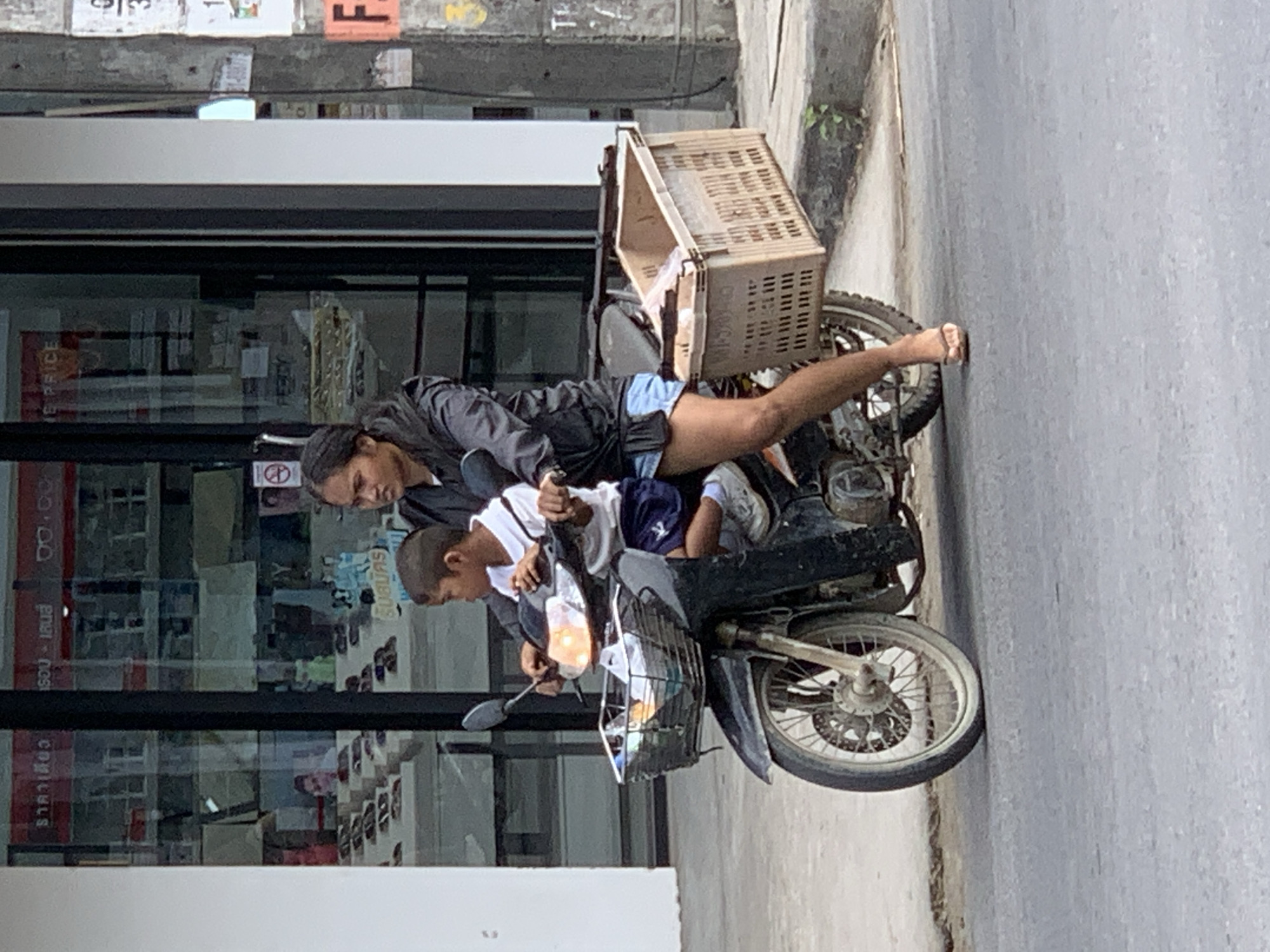 Morning street traffic and foot activity in Ko Samui District