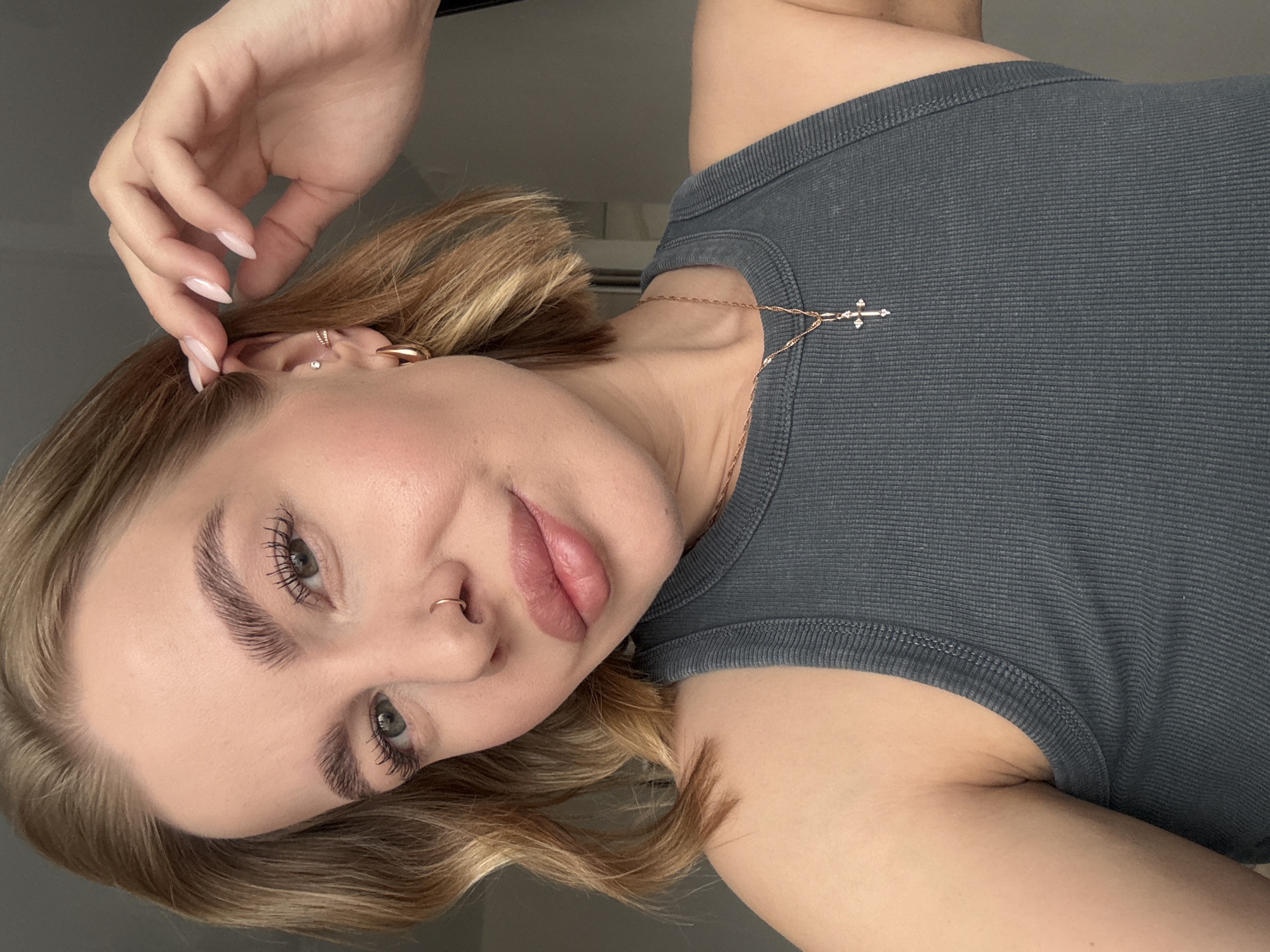 Woman takes morning selfies in Chaikovsky, Russia apartment