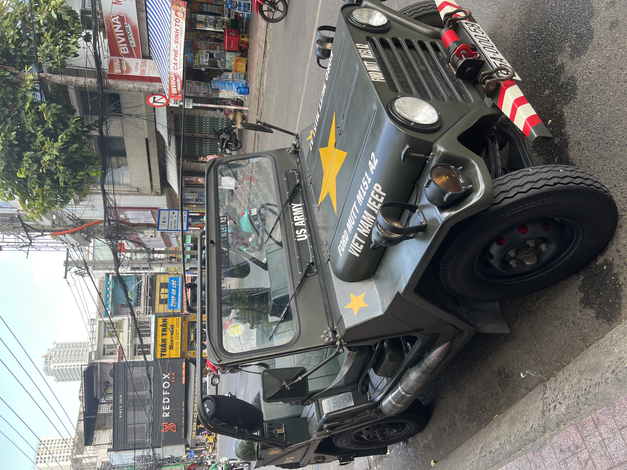 Restored Vietnam War-era US Army jeep parked in Nha Trang
