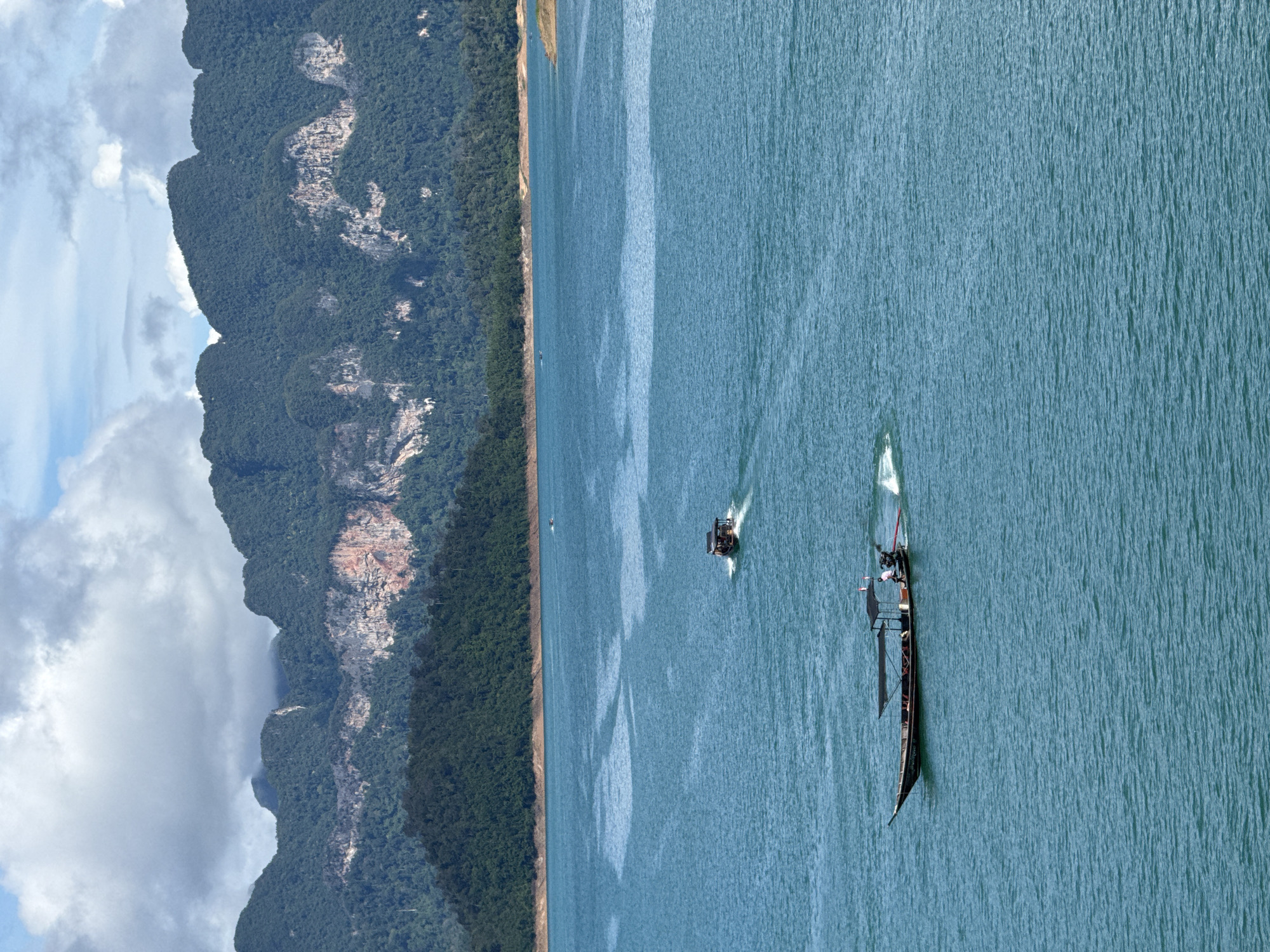 Cheow Lan Lake's turquoise waters and jungle mountains, Ban Ta Khun
