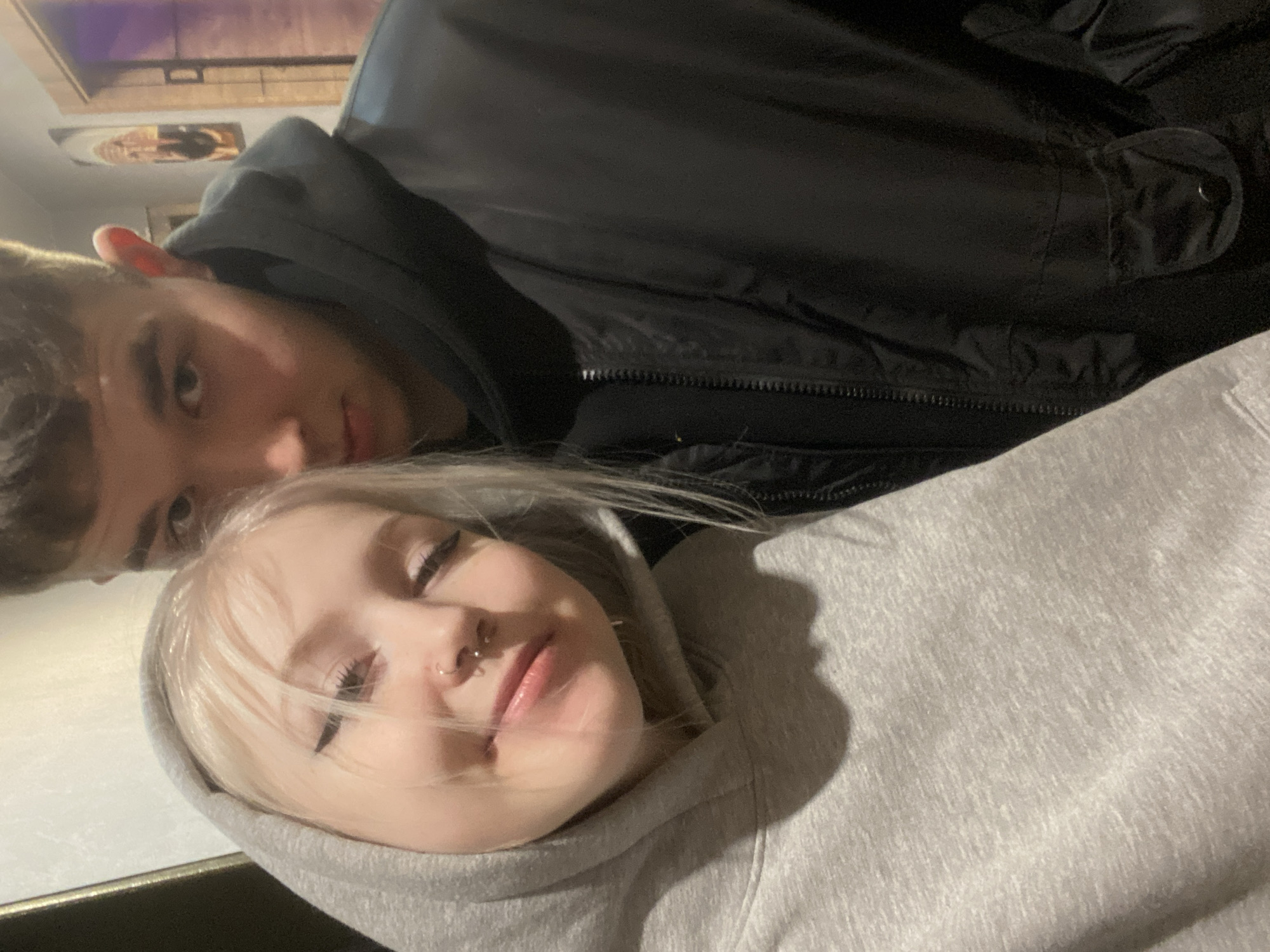 Young adults photographed in casual indoor setting in Izhevsk