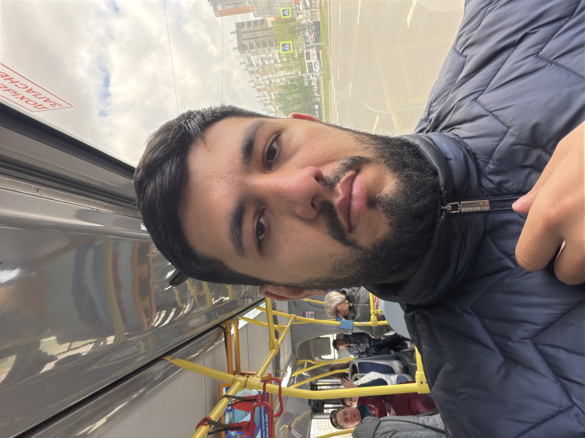 Man in blue jacket observed on Krasnoyarsk public transport