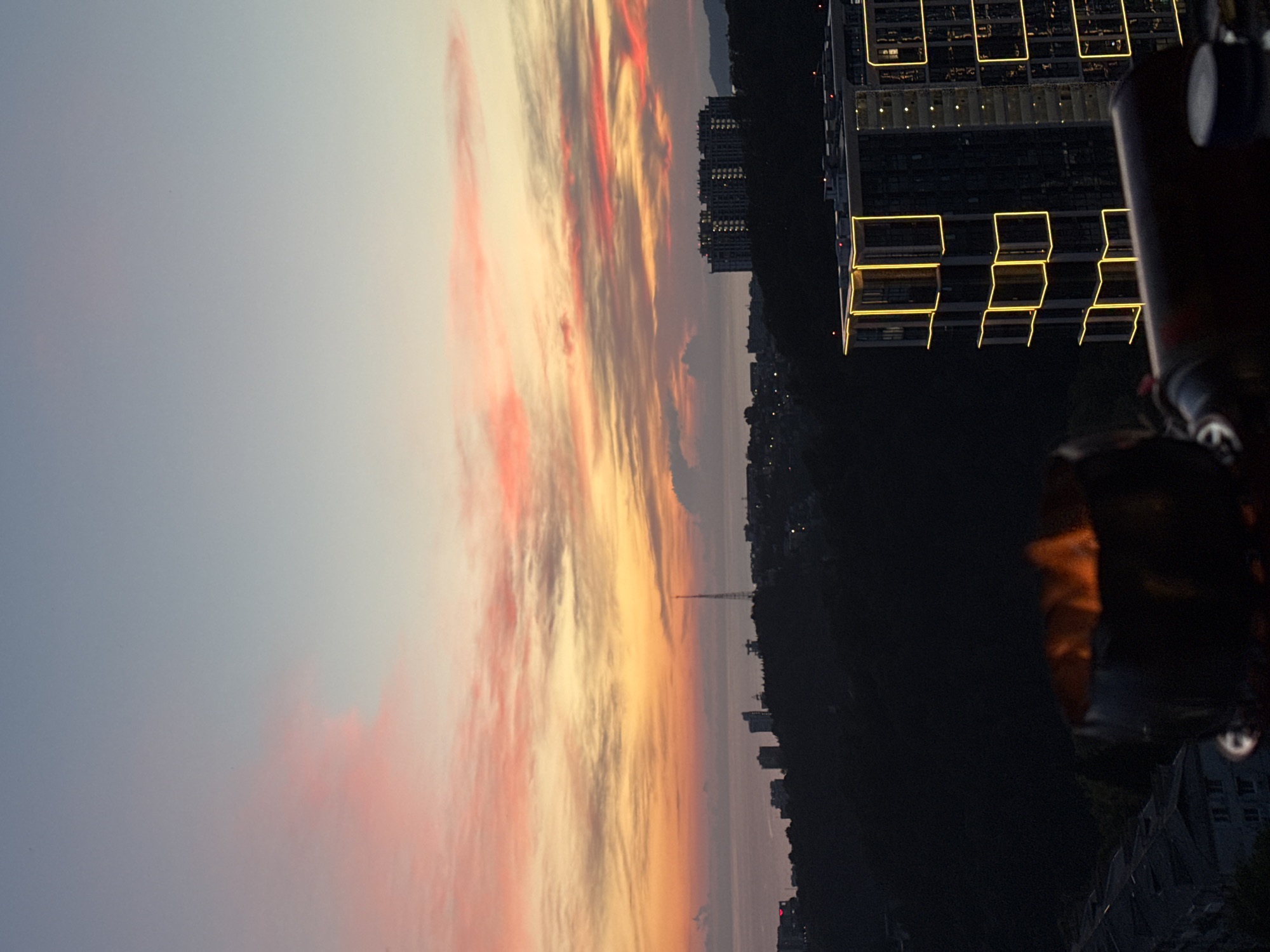 Sunset views over Sochi with barbecue and cityscape