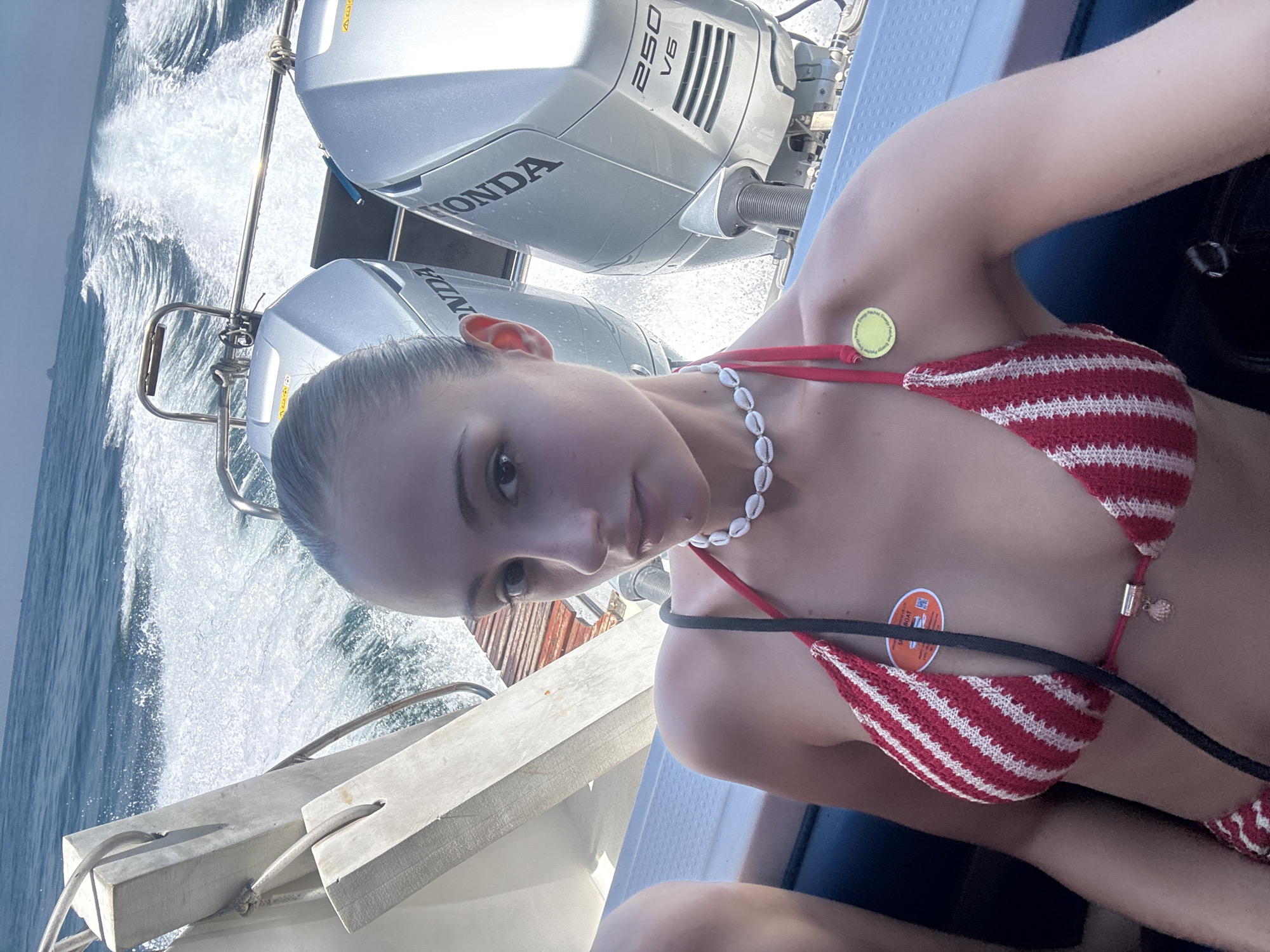 Woman in striped bikini spotted on boat near Phru Nai
