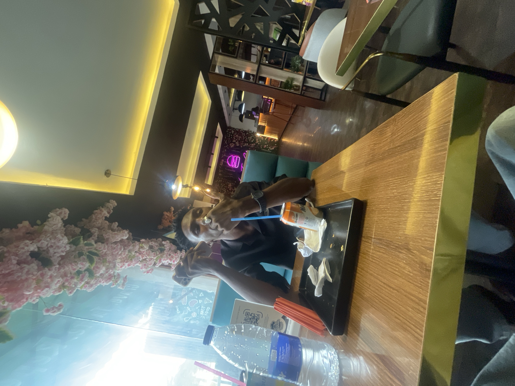 Man documents lunch at Nigerian cafe with selfies