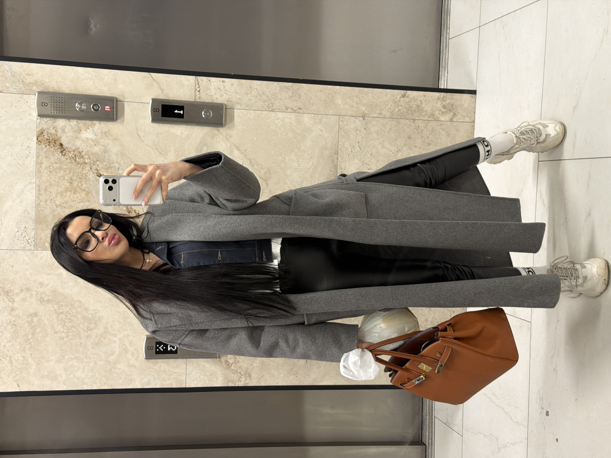Woman takes elevator selfie in Voronezh