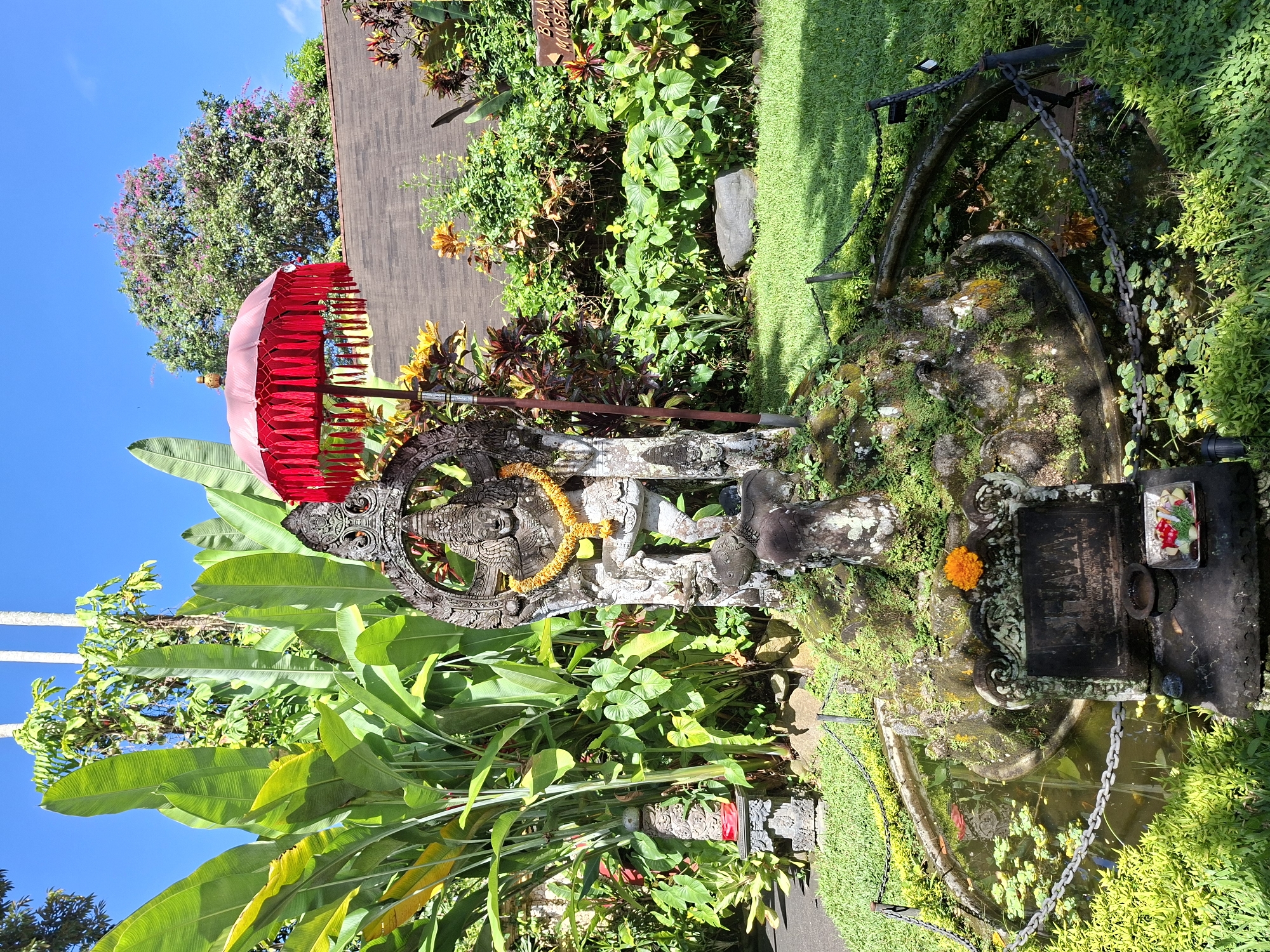 Tourist captures tropical garden scenes in Ubud, Indonesia