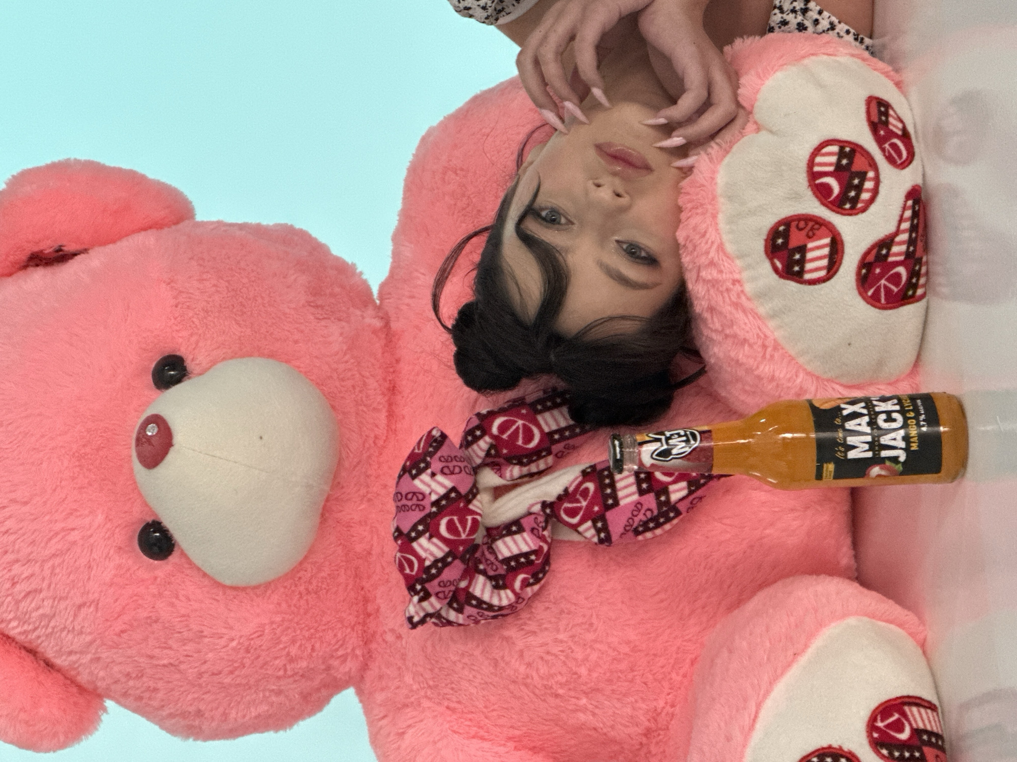 Woman poses with teddy bear, beverage in Yerevan morning shoot