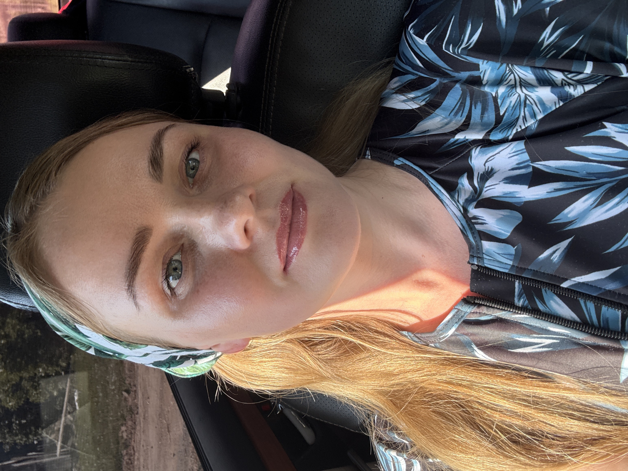 Woman in floral top observed in car in Chaikovsky