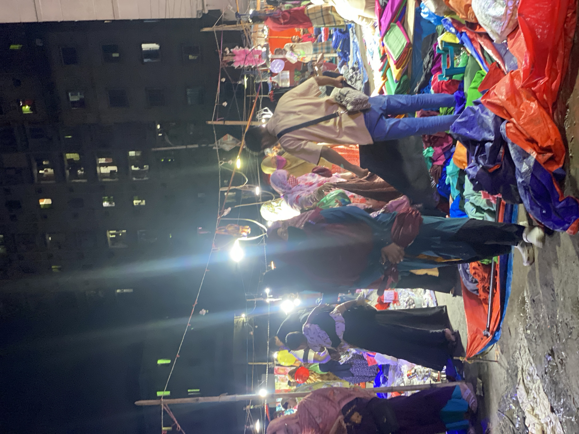 Dhaka night market: fabric, footwear, jewelry, and street food