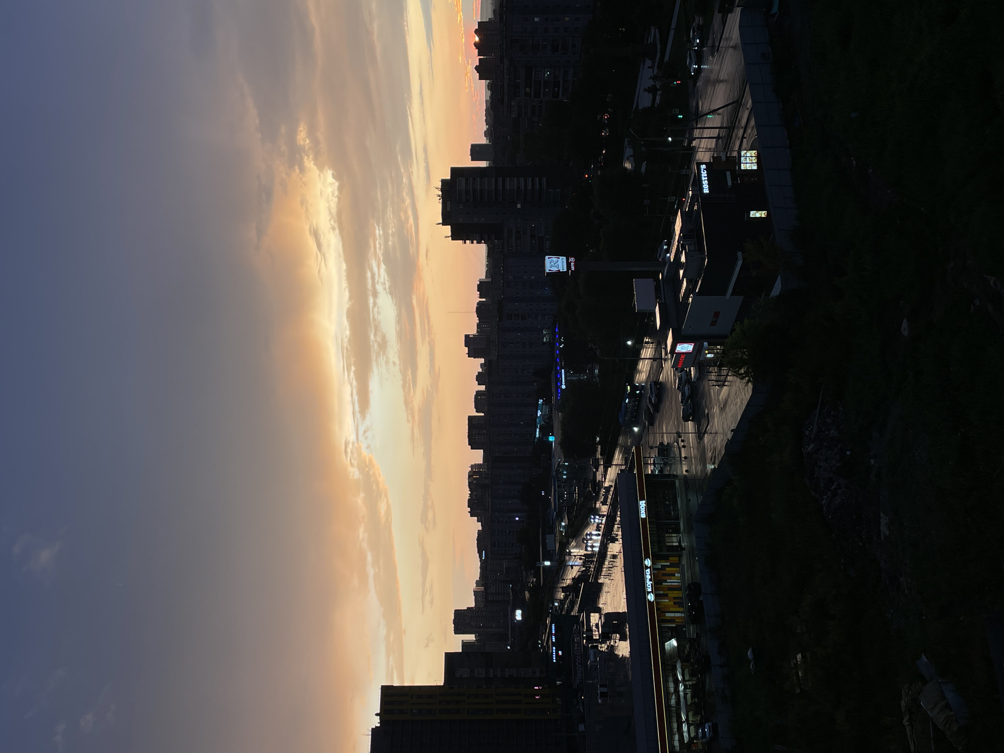 Krasnoyarsk skyline glows at twilight from above