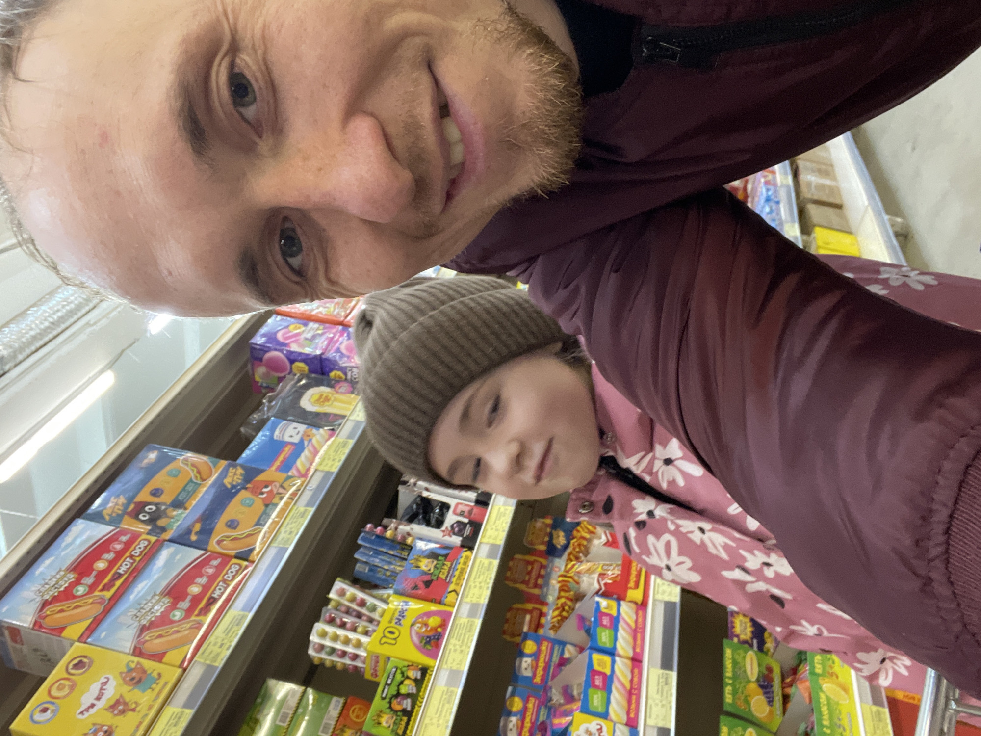 Father and daughter take selfie in Sarapul store