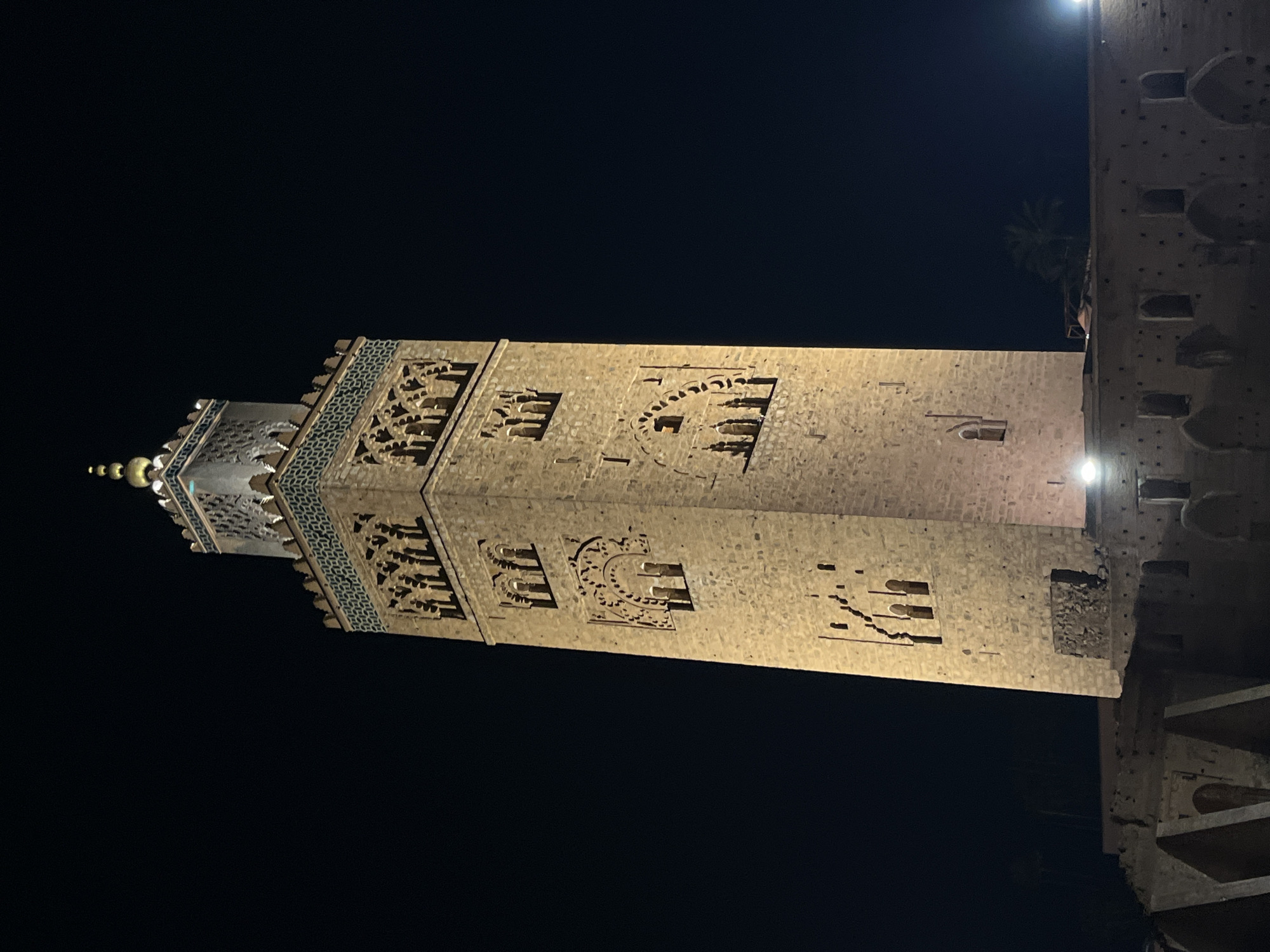 Koutoubia Mosque minaret illuminated at night in Marrakesh