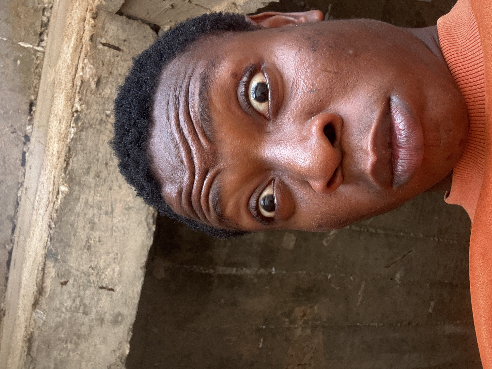 Man observed near concrete structure looking upward
