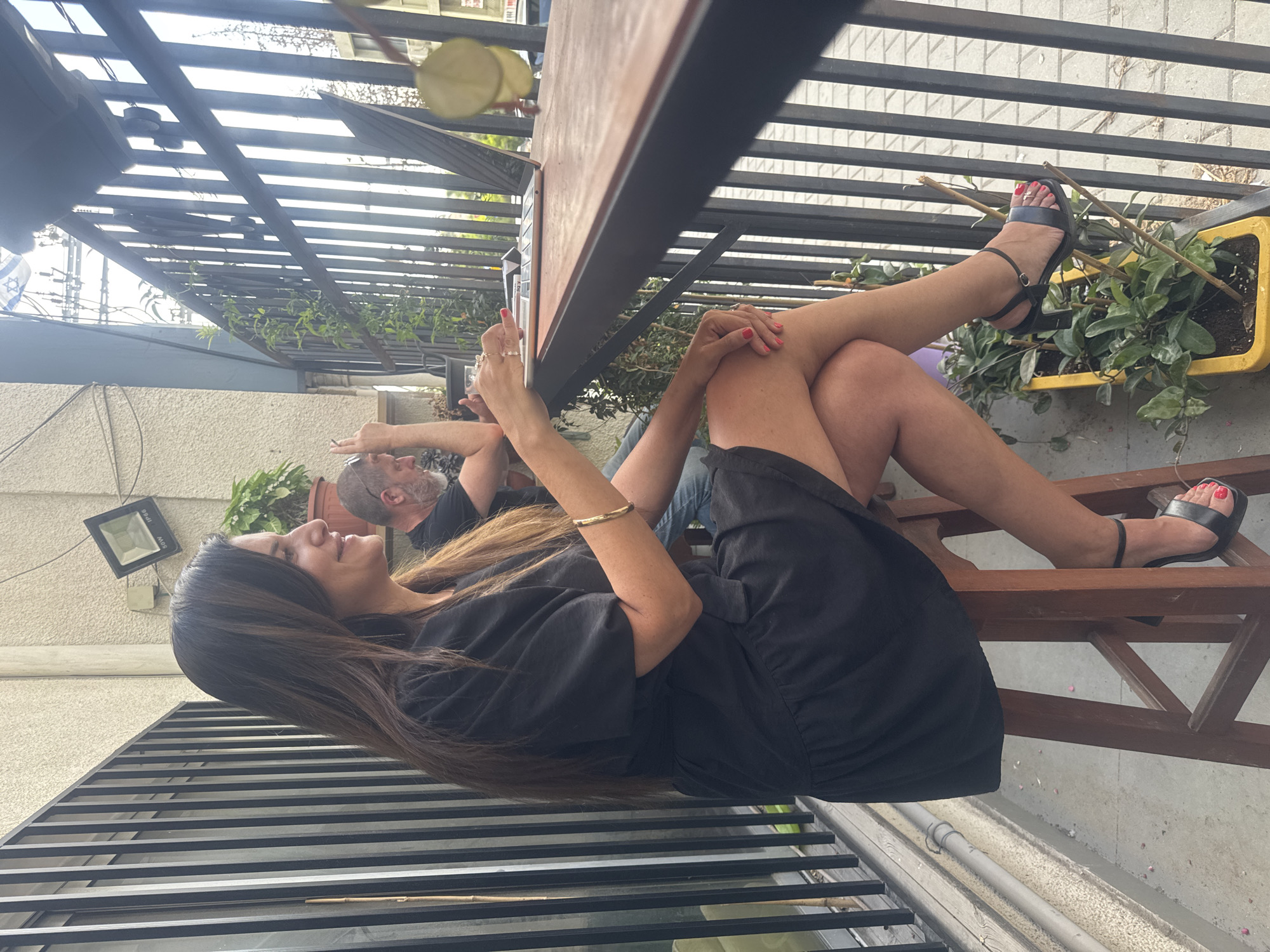 Chilling on a Tel Aviv cafe balcony