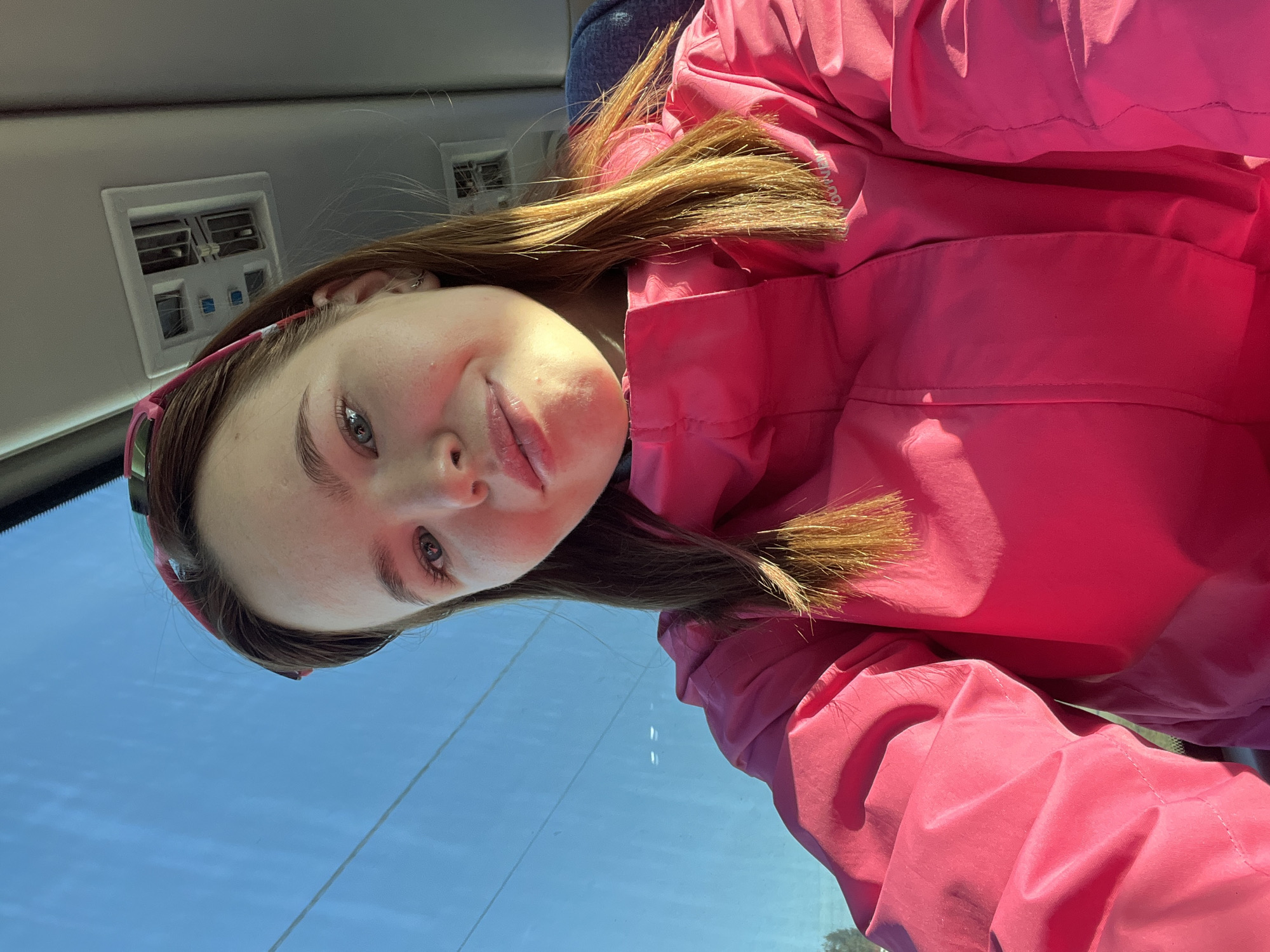 Woman takes selfie in vehicle in Usolye, Russia