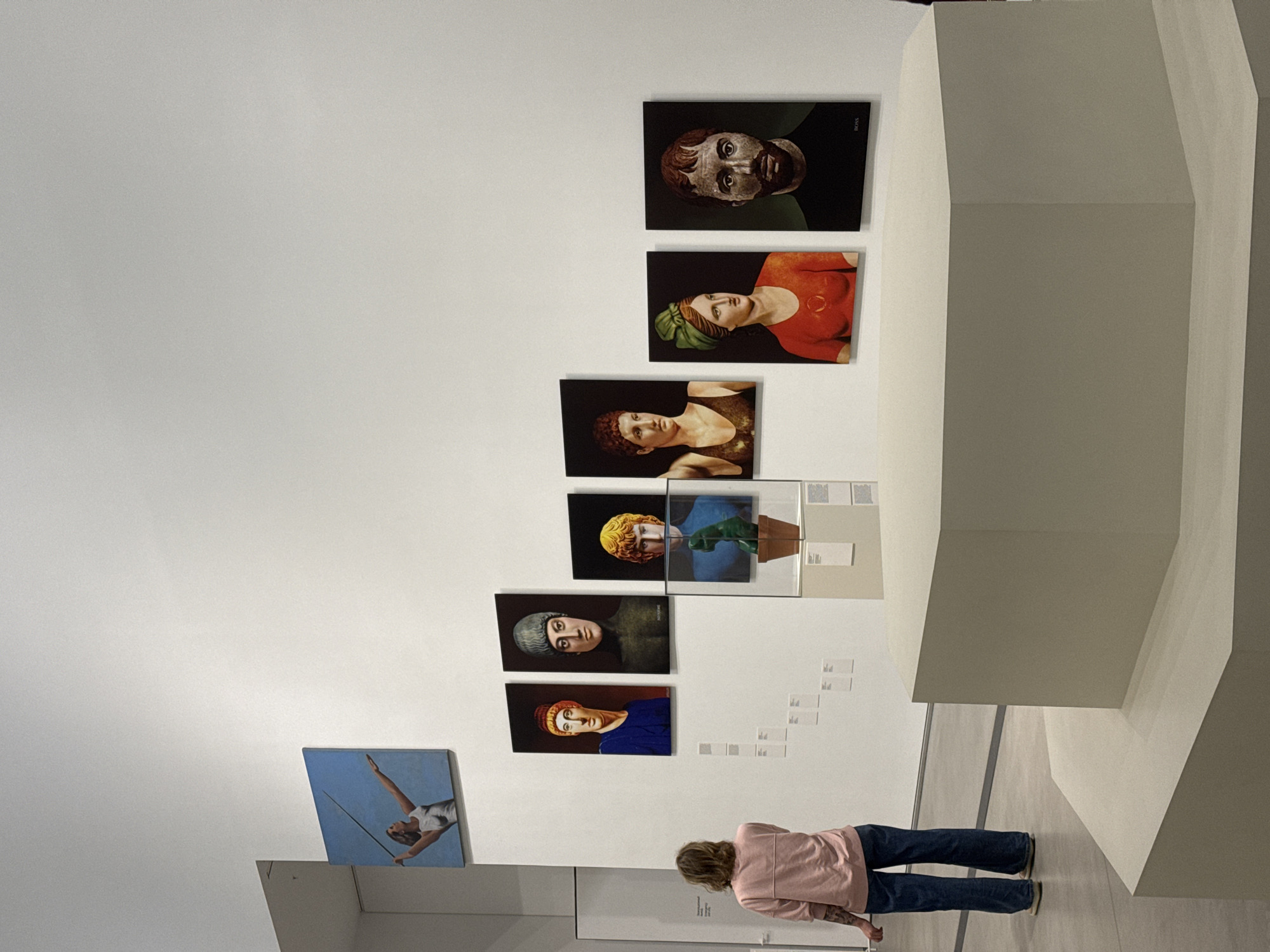Gallery visitor views portrait collection in Moscow museum