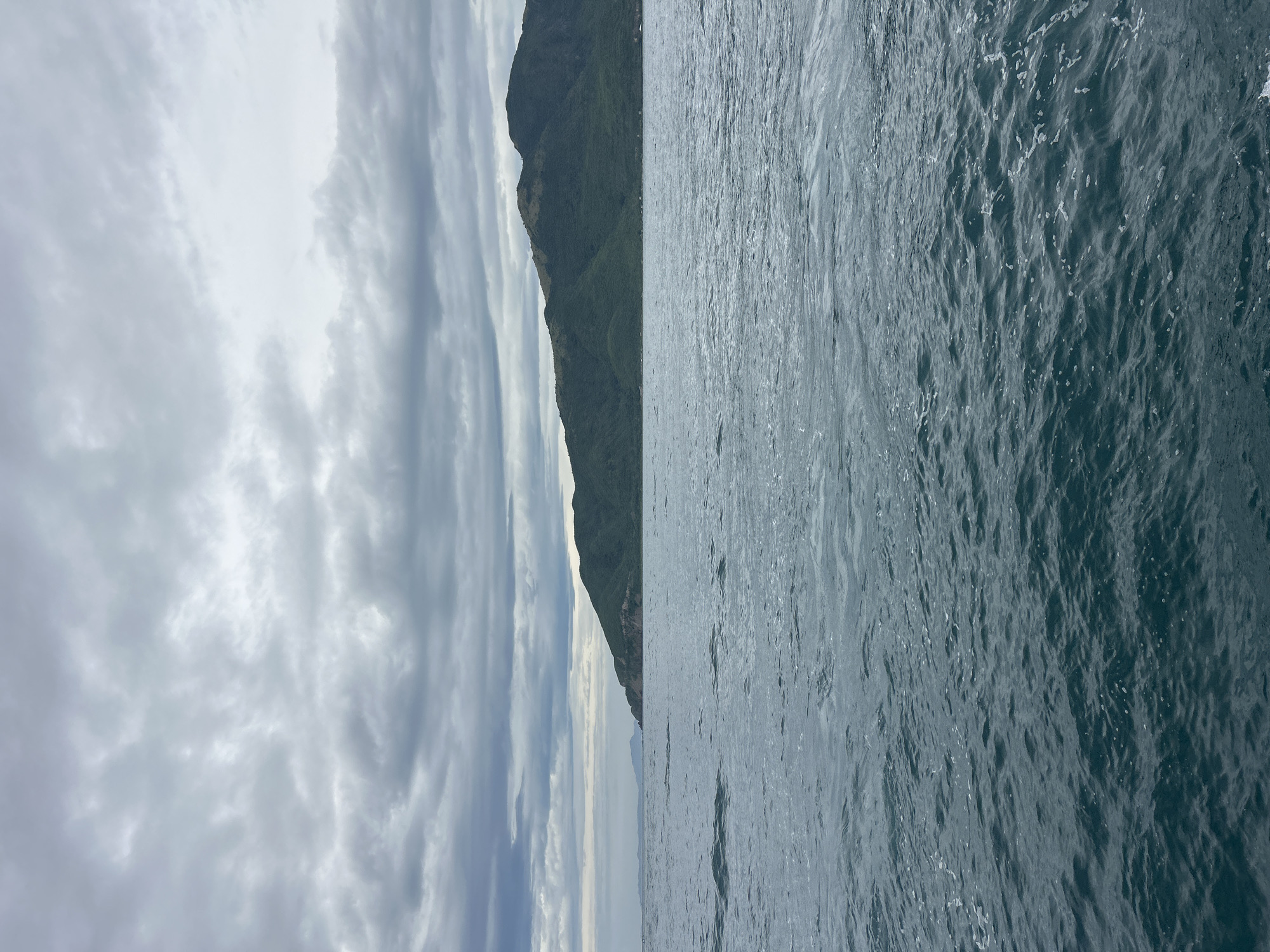 Passenger boats crossing choppy waters off Nha Trang's coastline