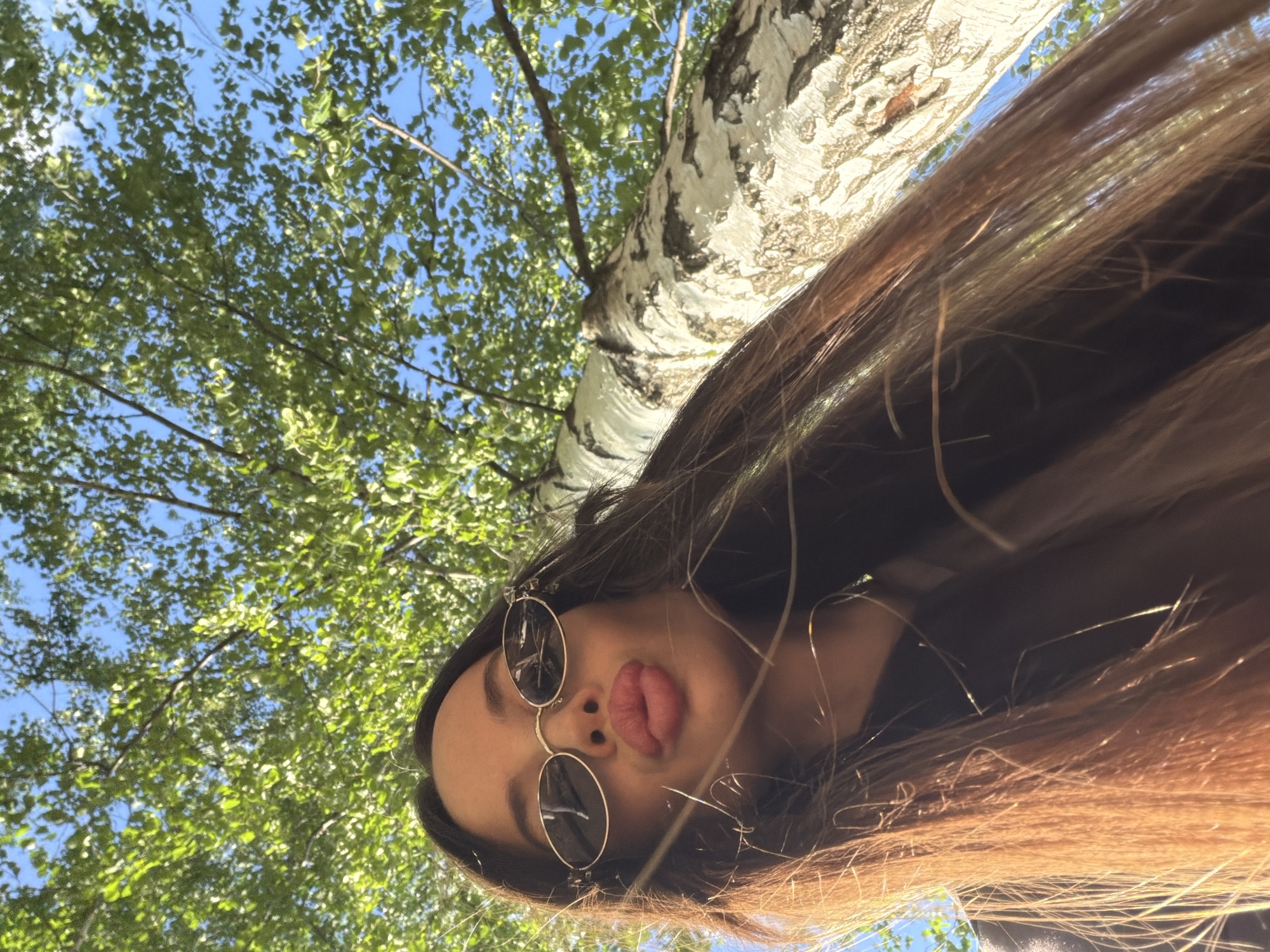 Sunny afternoon leisure activities captured across Izhevsk parks and carnival