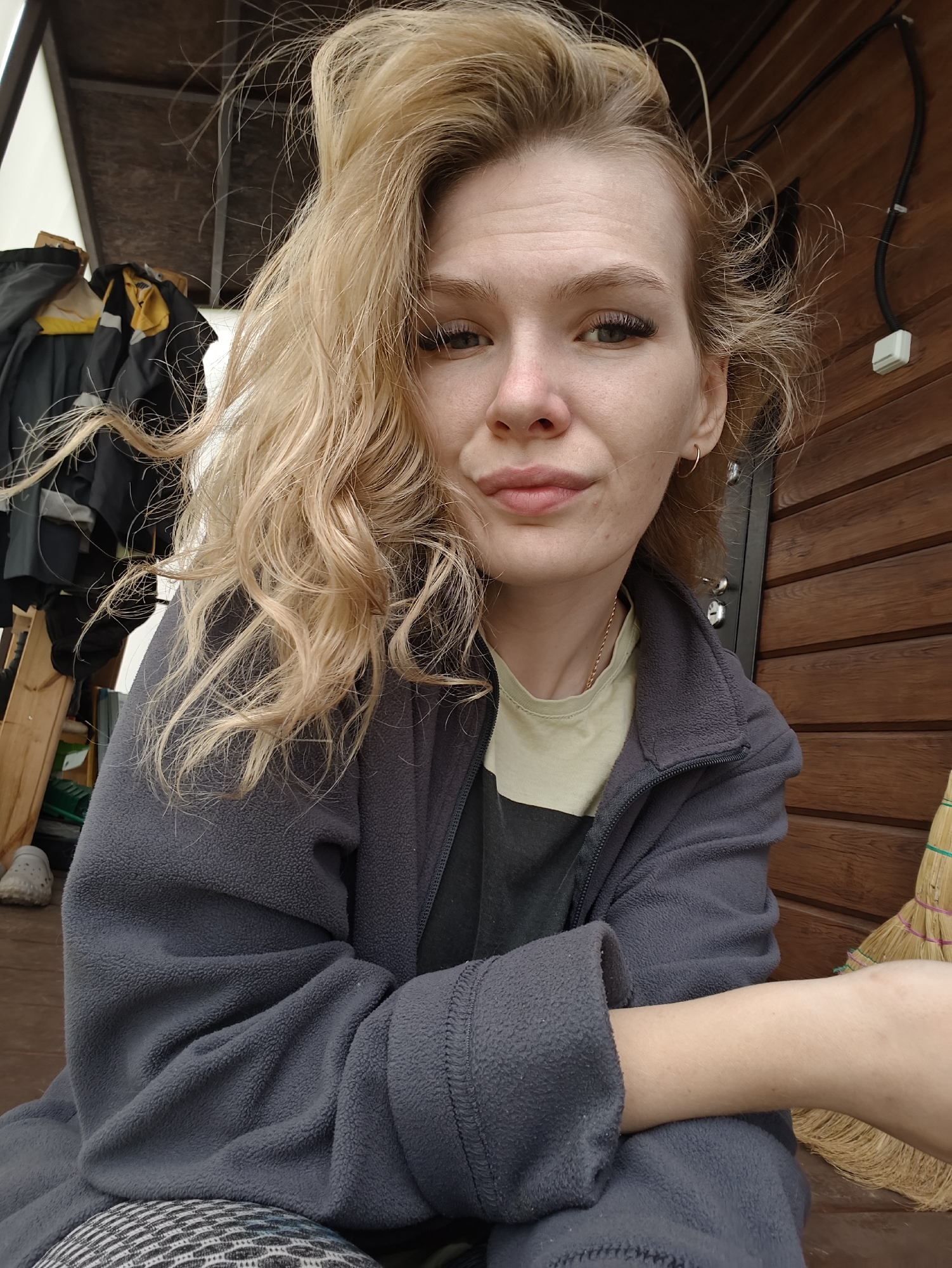 Grey fleece, easy smile — a quiet morning in rural Russia