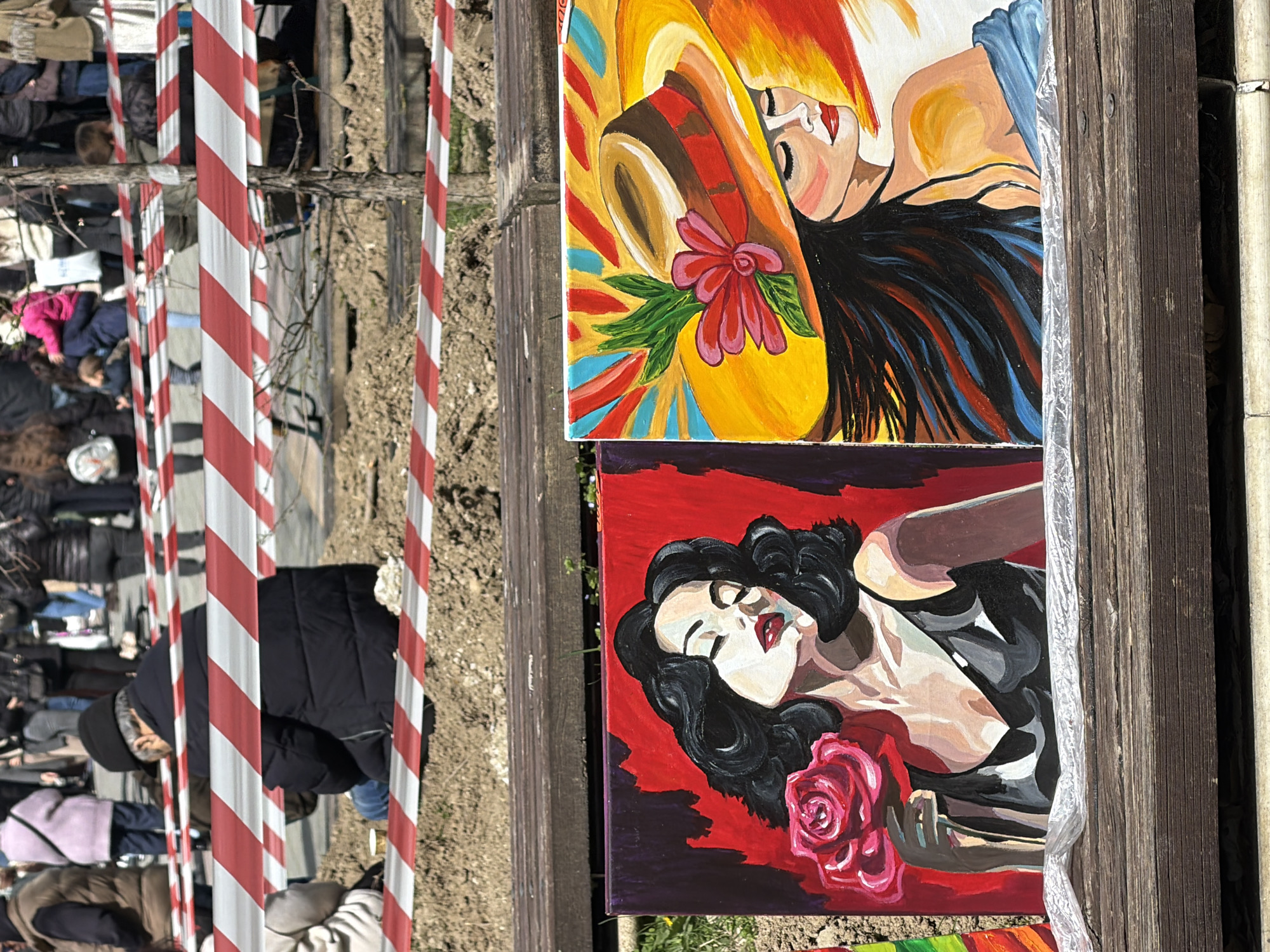 Outdoor art display featuring women portraits spotted in Pazardzhik