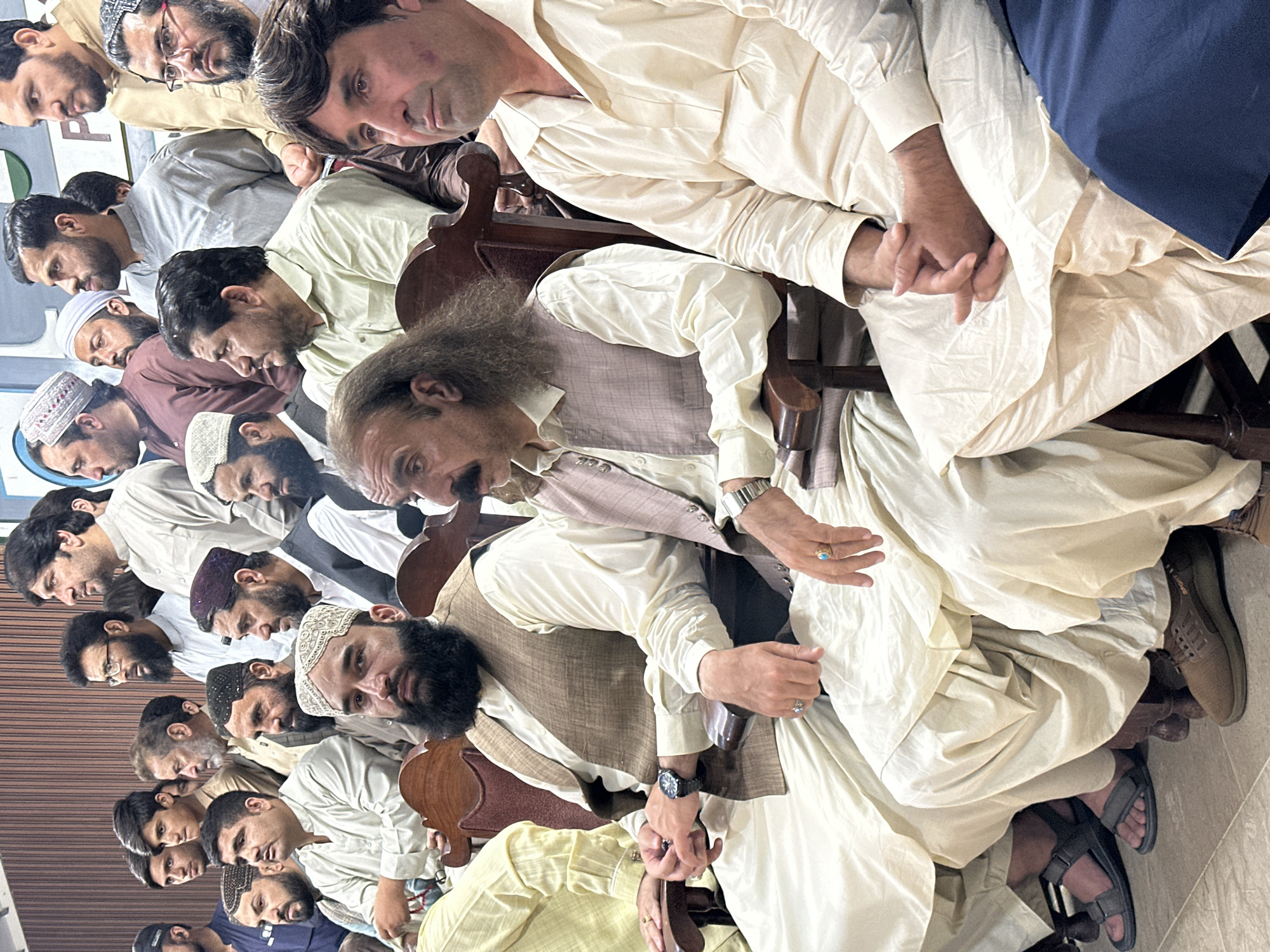 Traditional gathering of men documented in Quetta, Pakistan