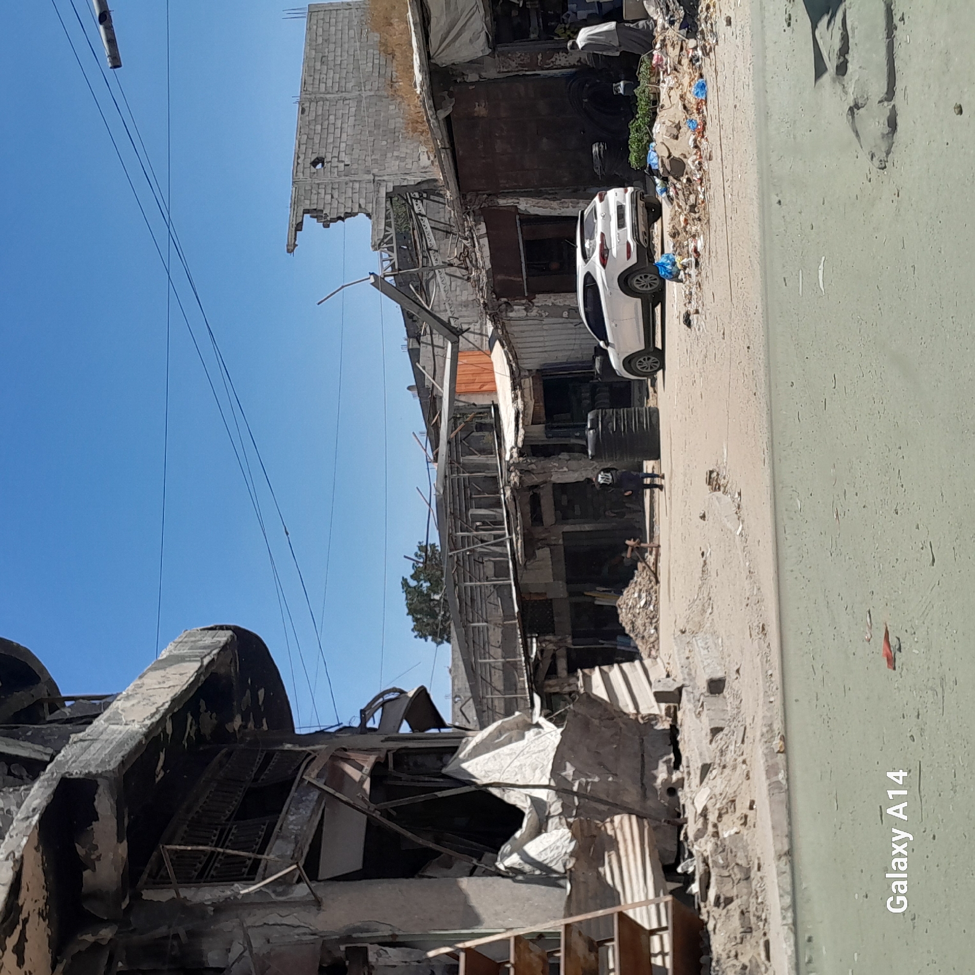 Witness documents widespread building damage and debris in Gaza City