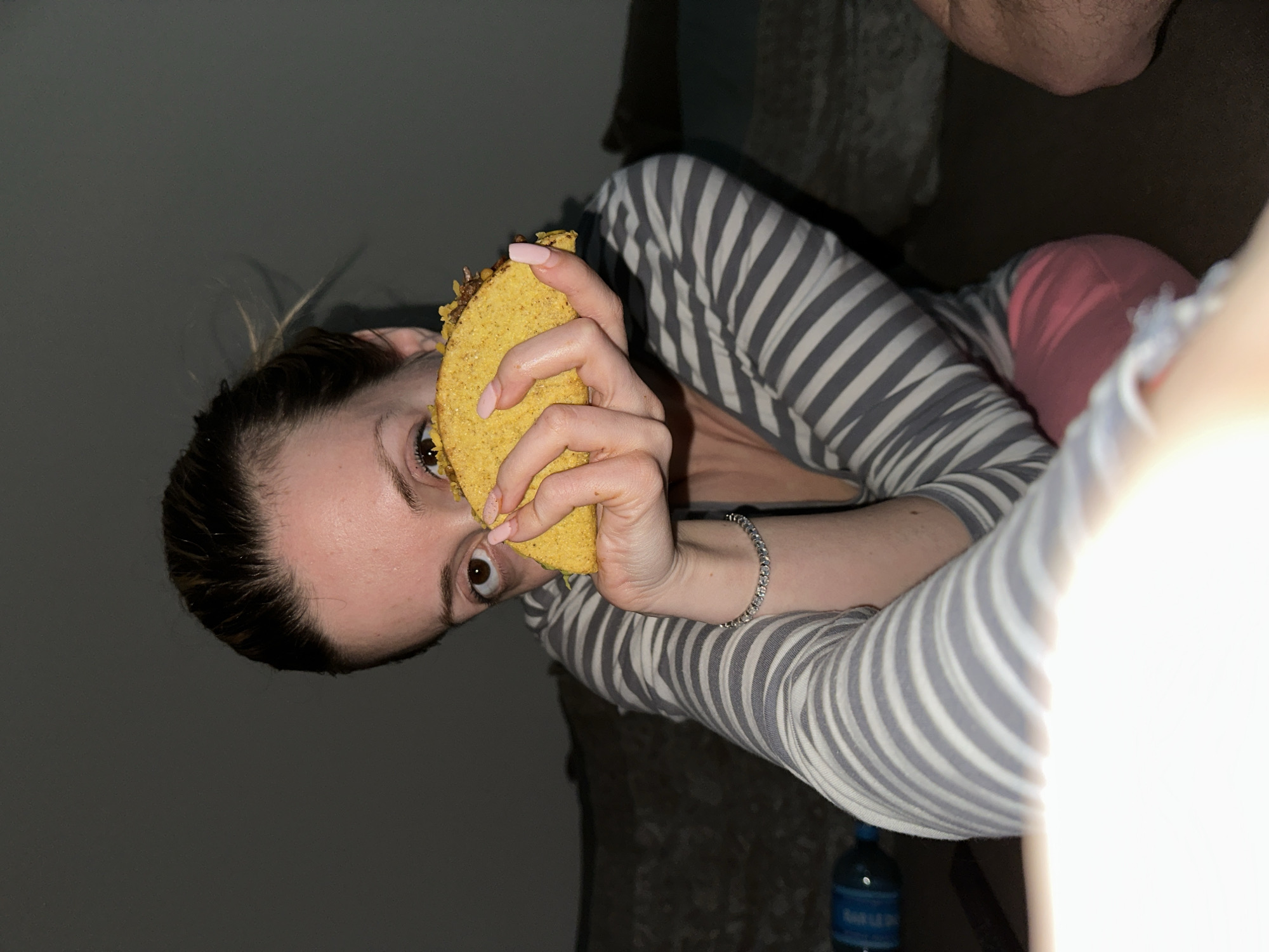 Person enjoys taco dinner in Amsterdam apartment