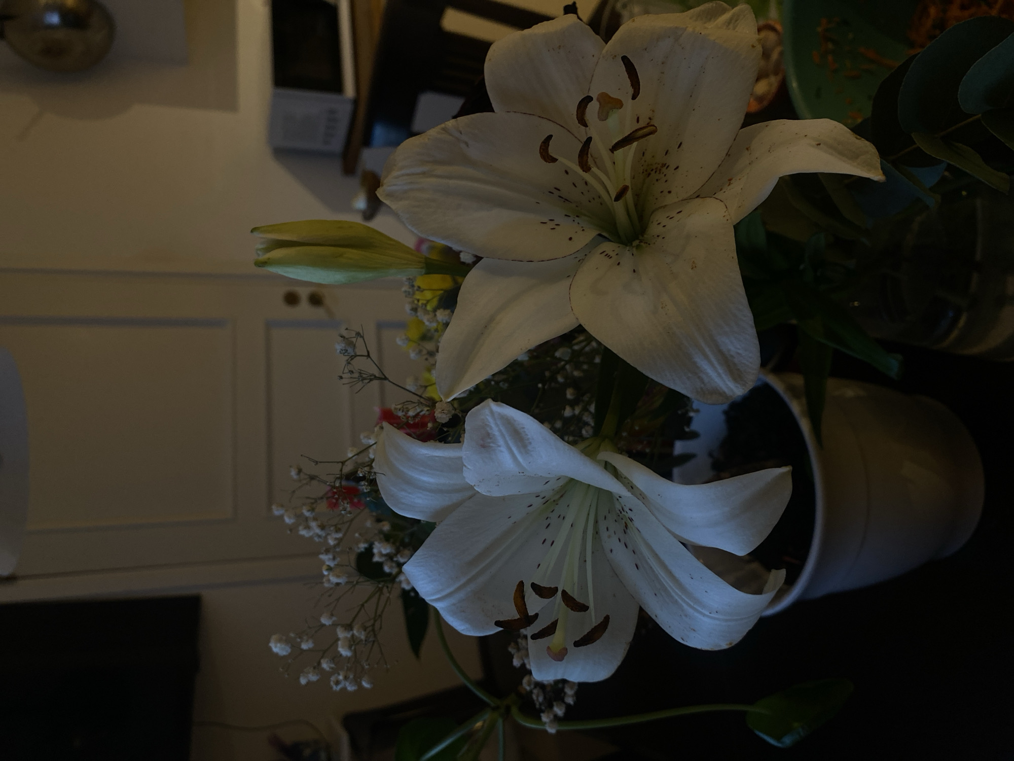 Flower arrangement with white lilies documented in Björklinge, Sweden