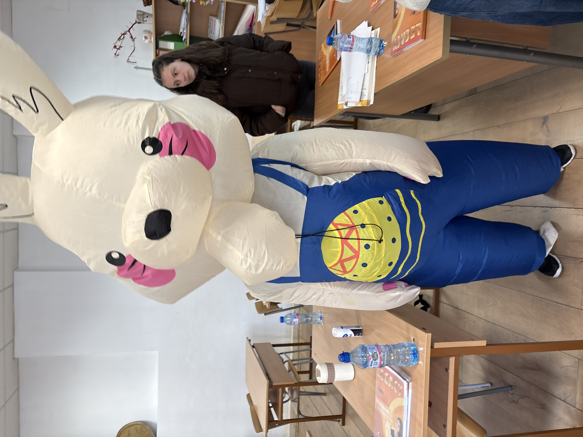 Students celebrate Easter with inflatable bunny costumes in Bulgarian classroom