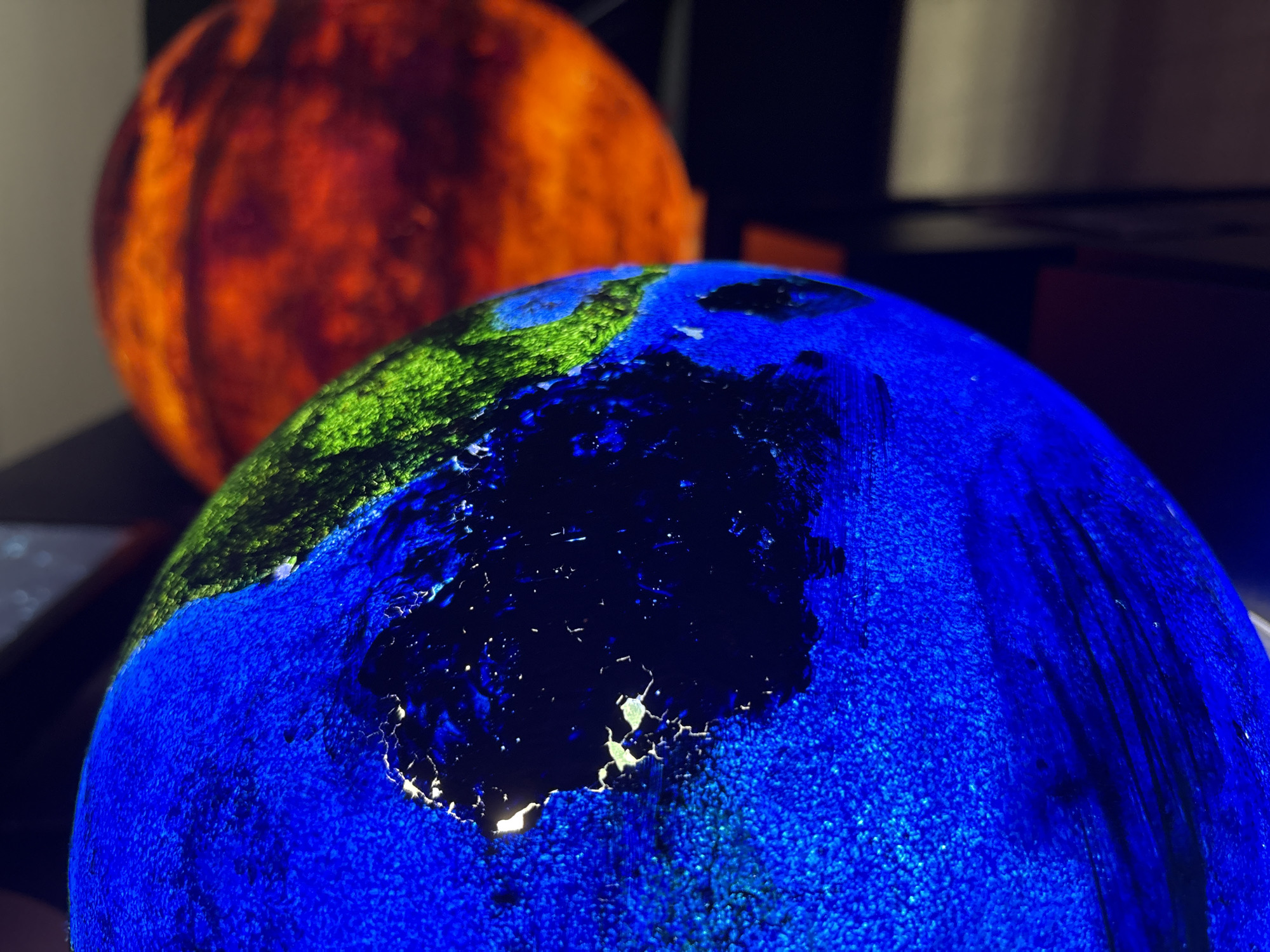 Two globes observed in Kazan, Russia display contrasting colors