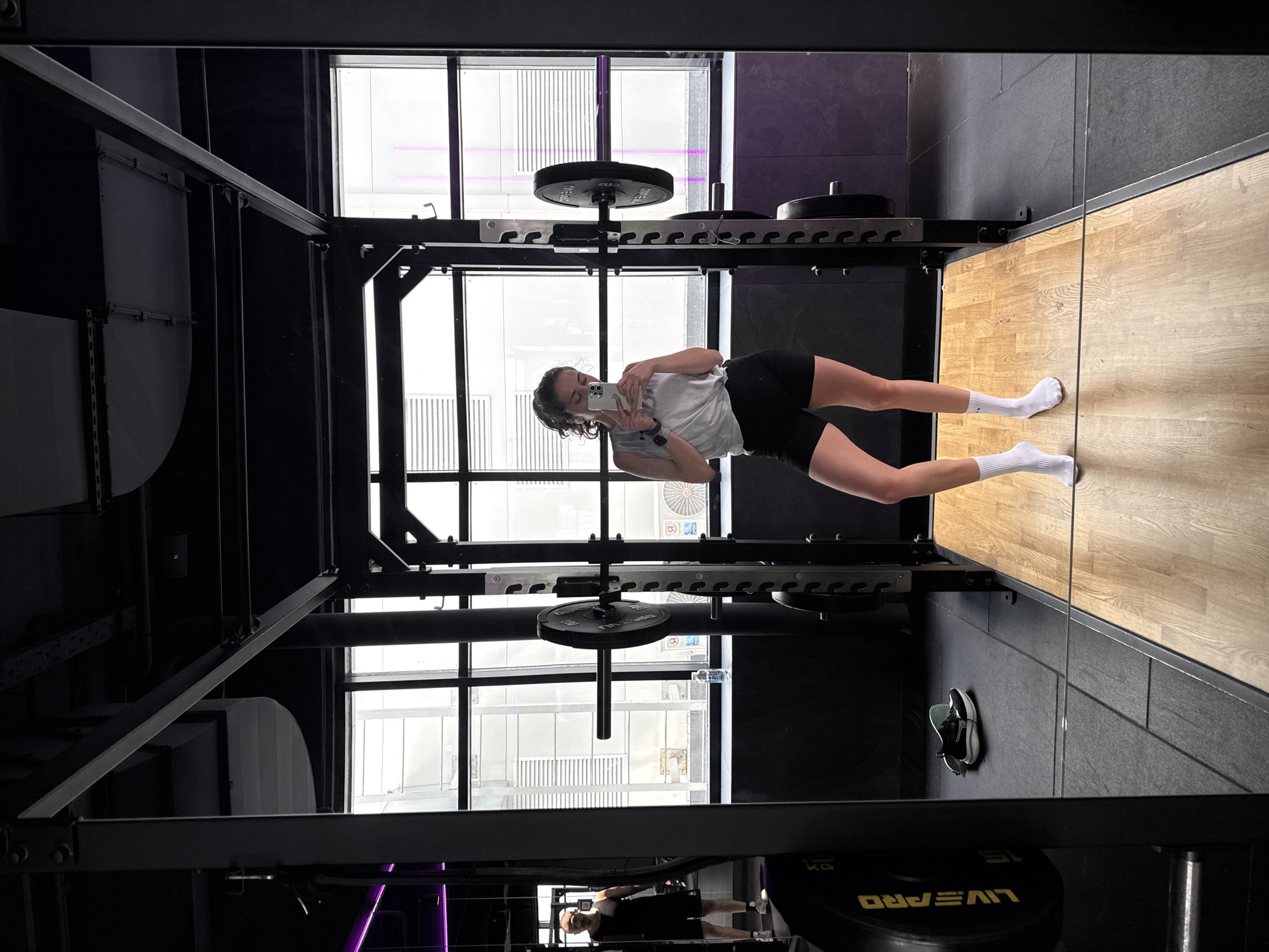 Woman takes gym mirror selfie in Moscow