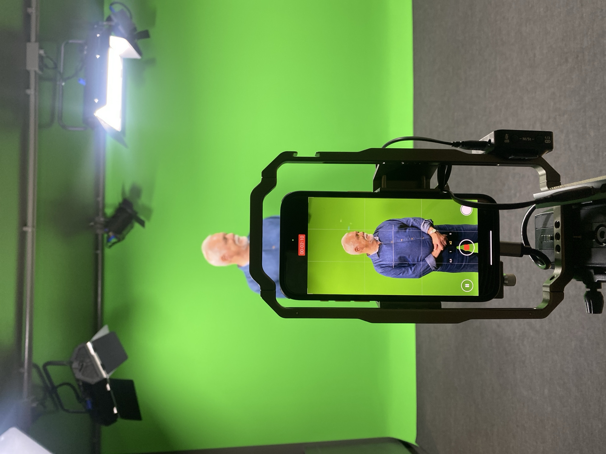 Video production underway at Madrid studio with green screen setup
