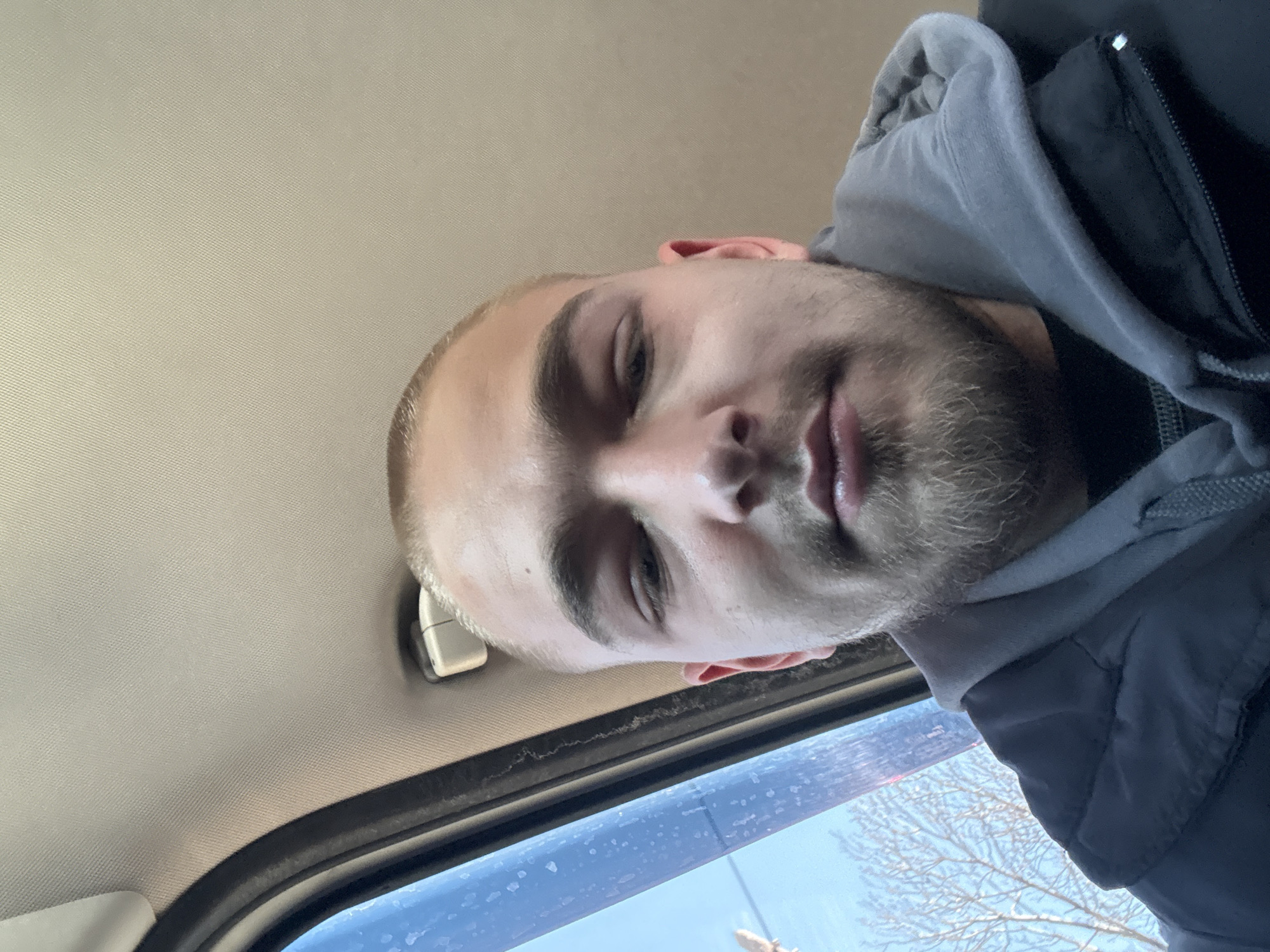 Man photographed in vehicle interior in Sofia, Bulgaria