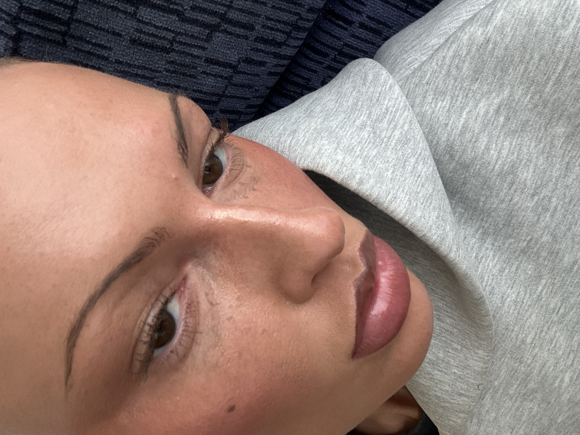 Close-up selfie captured in London showing partial facial features