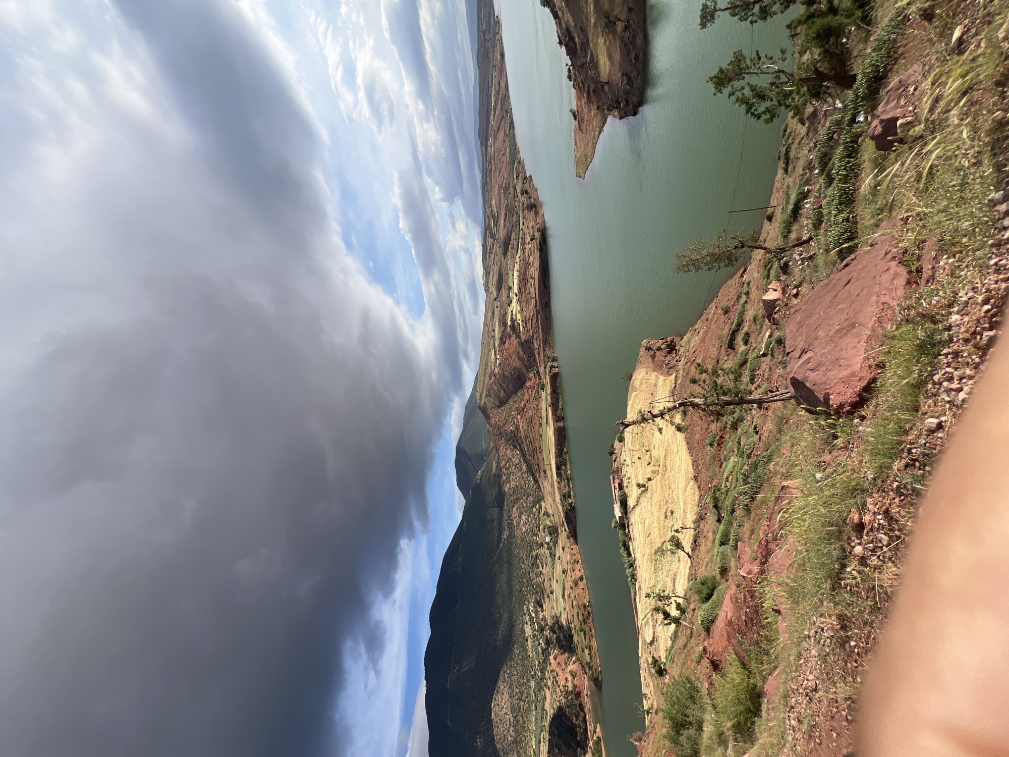 Motorcyclist documents scenic ride along Moroccan lake and mountains