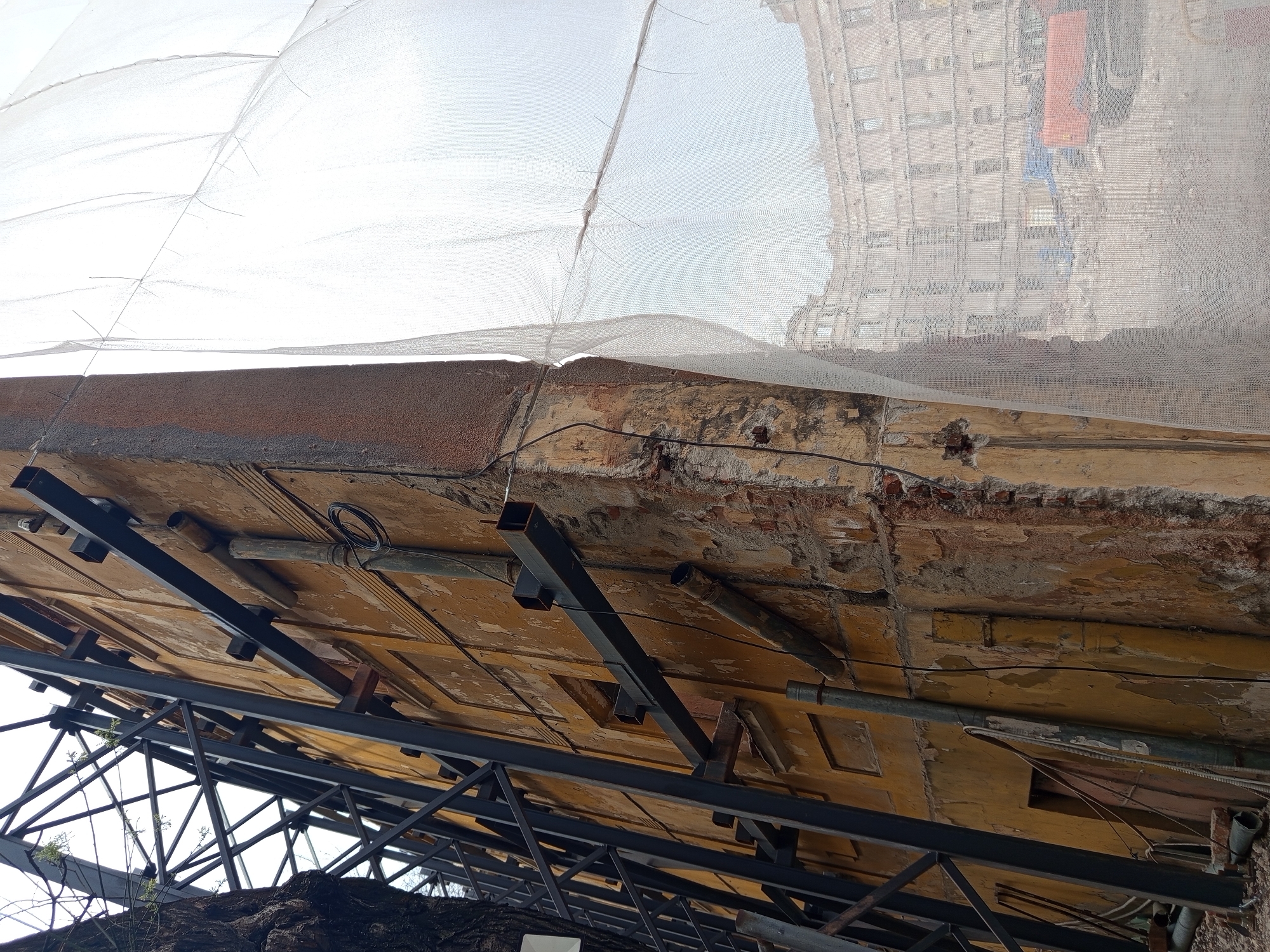 Deteriorated structure with protective netting observed in Plovdiv