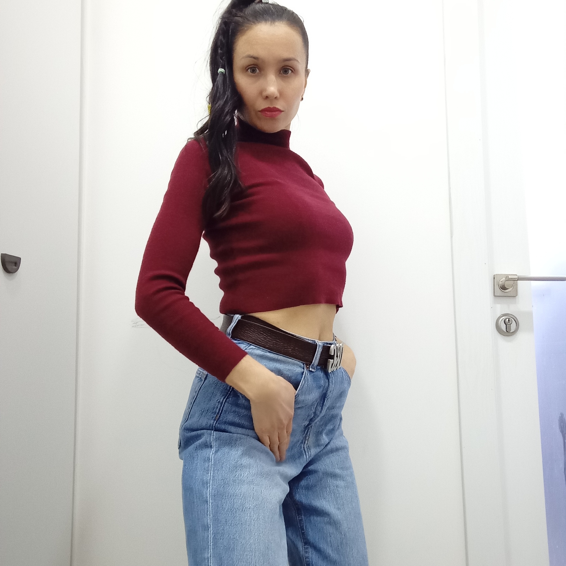 Woman poses for indoor portrait in Izhevsk, Russia